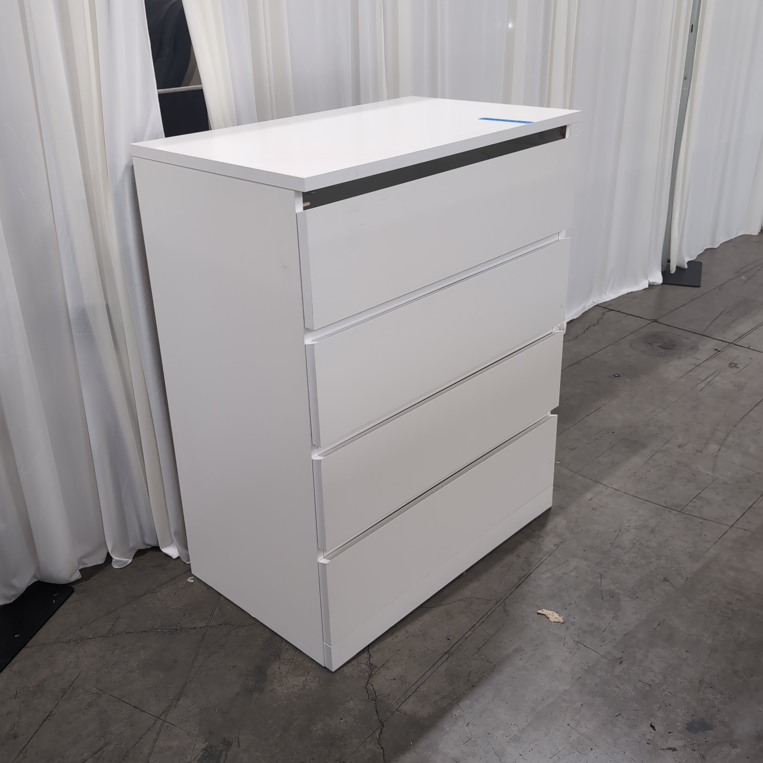 White Laminate Four-Drawer Dresser