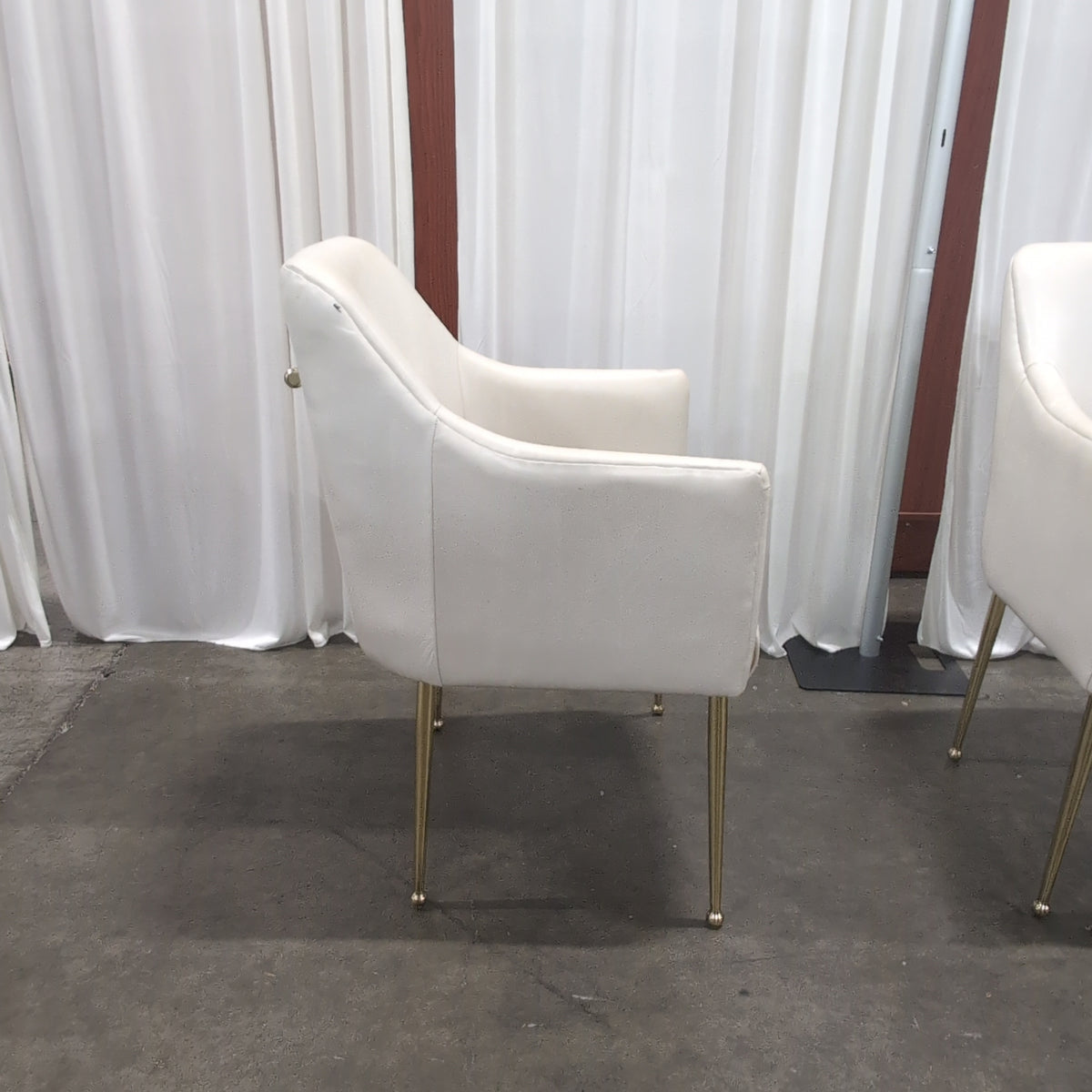 Pair of Antropologie Off-White Upholstered Arm Chair with Tapered Metal Legs