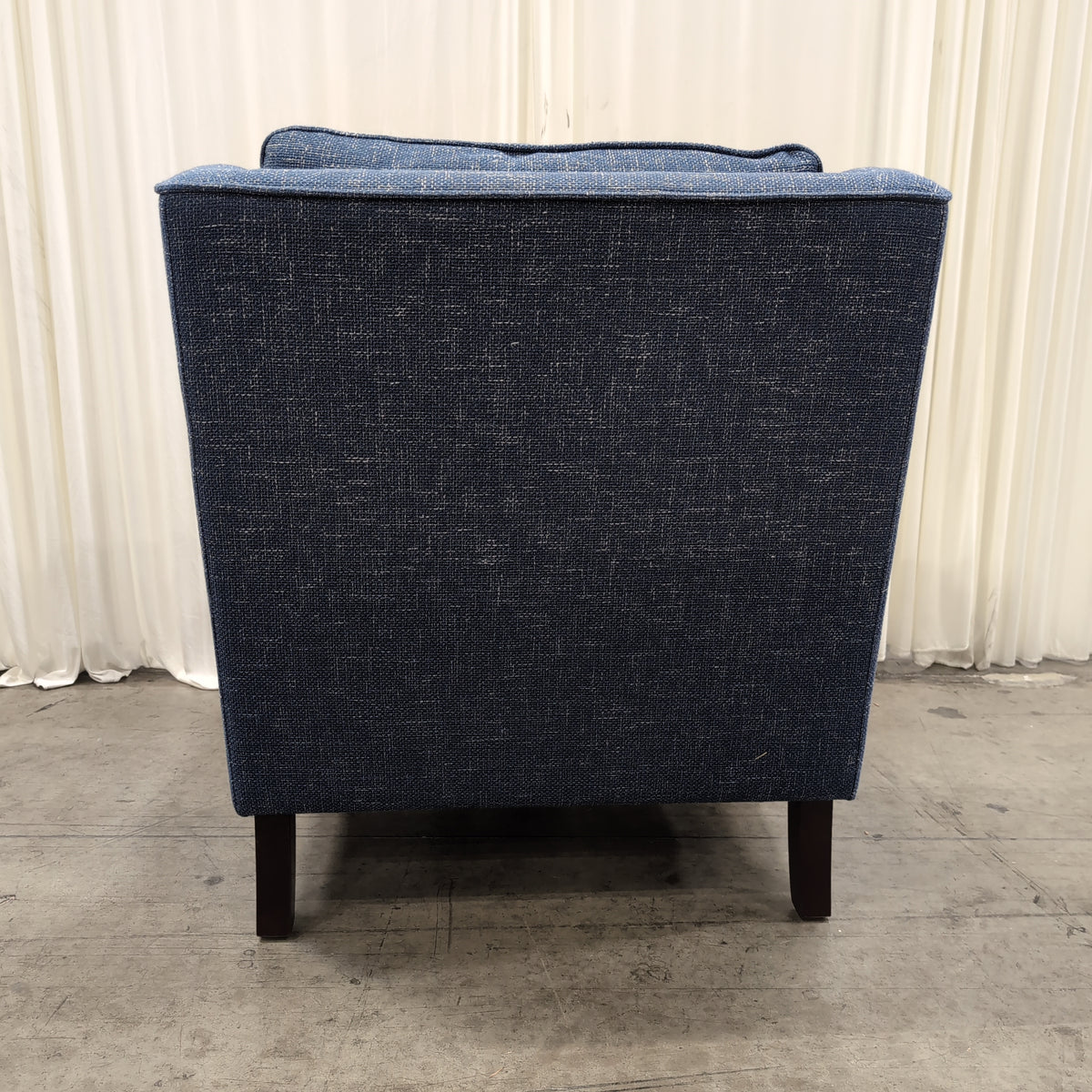Textured Blue Fabric Armchair with Dark Wood Legs