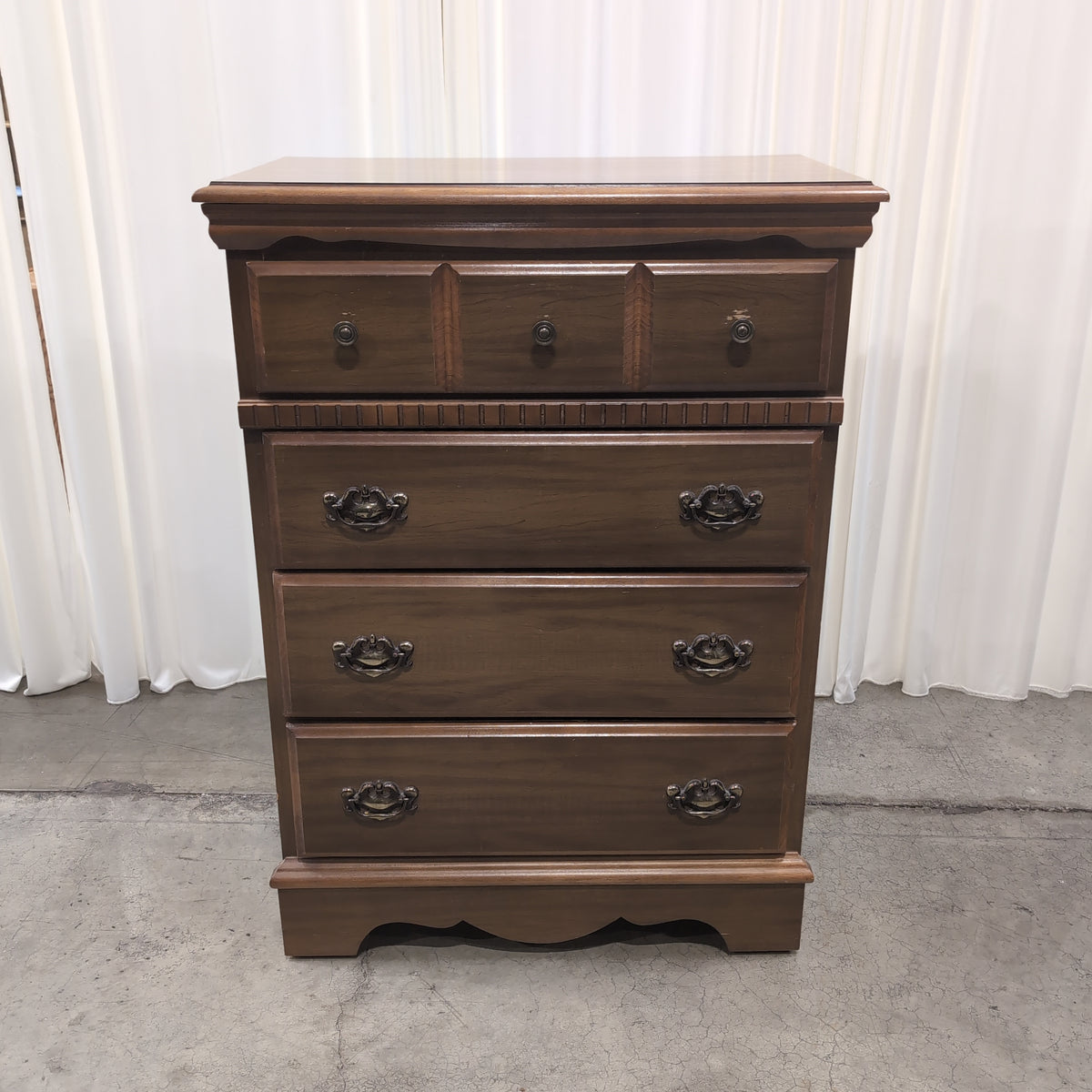 Traditional Warm Wood Five-Drawer Dresser with Ornate Hardware
