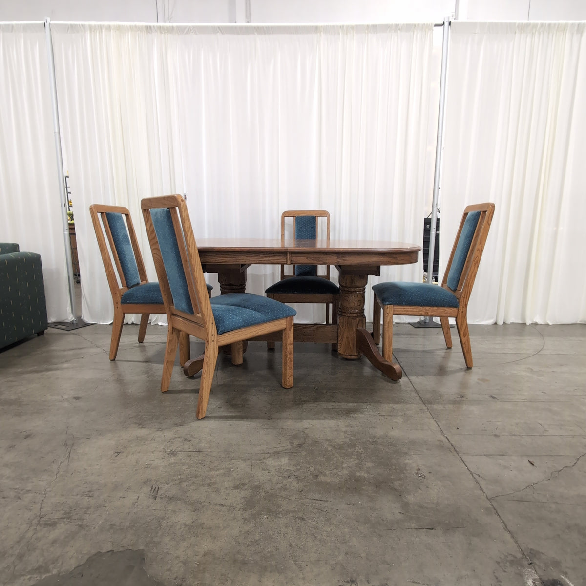 Reddish Brown Oval Pedestal Dining Table