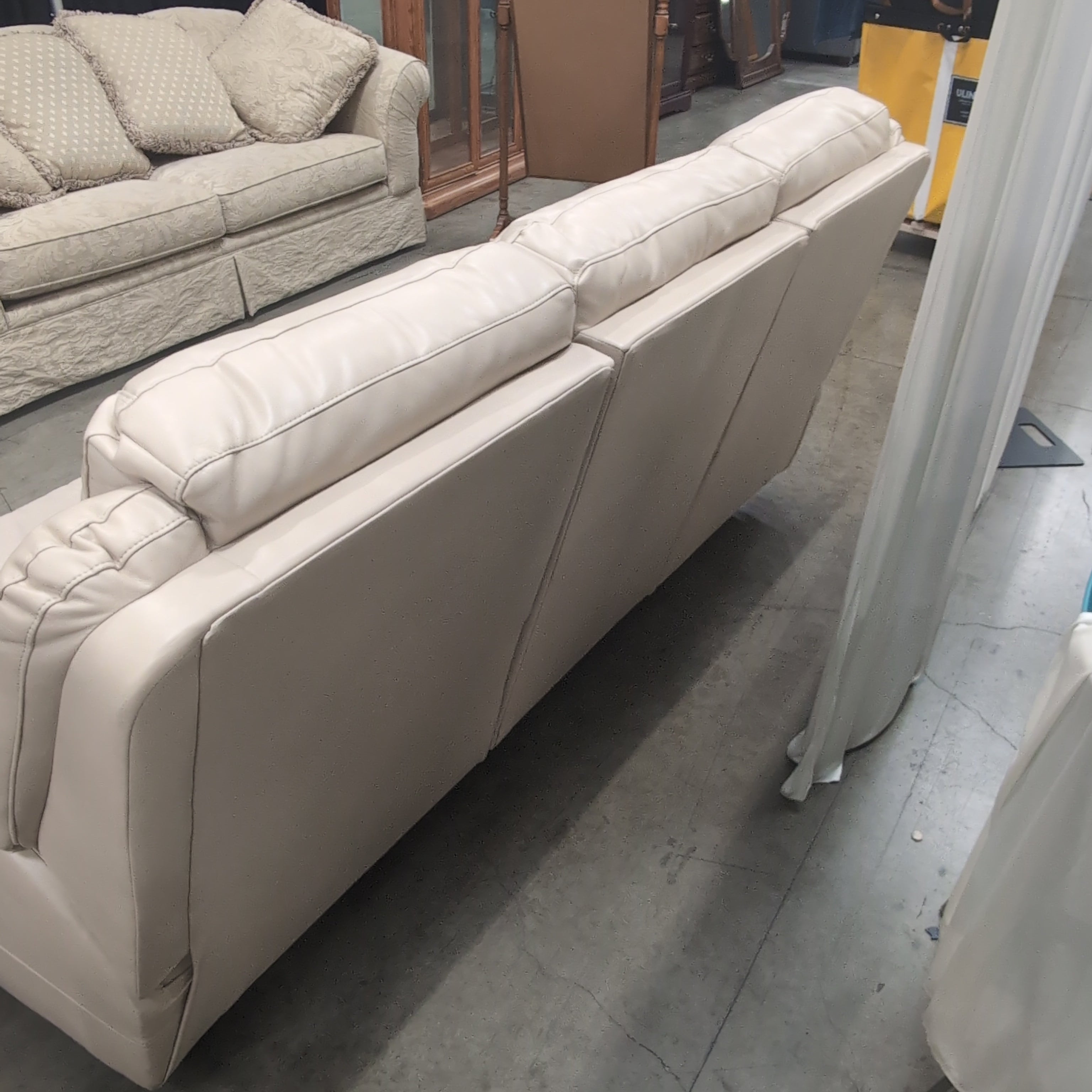Light Tan Leather Three-Seat Couch with Rolled Arms