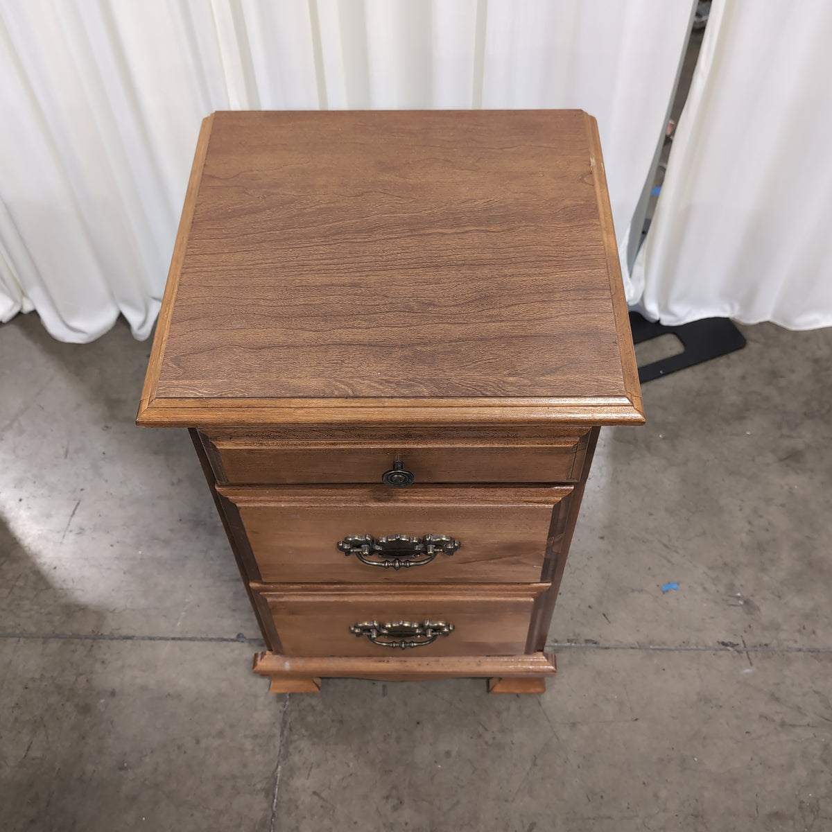 Traditional Style Three-Drawer Nightstand in Wood