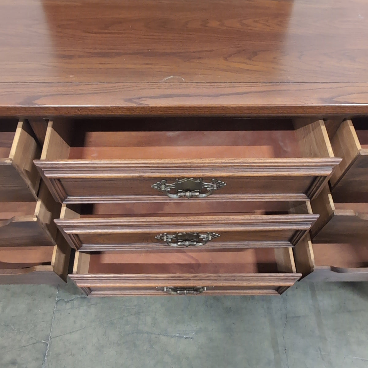 Traditional Dark Wood Buffet with Ornate Hardware