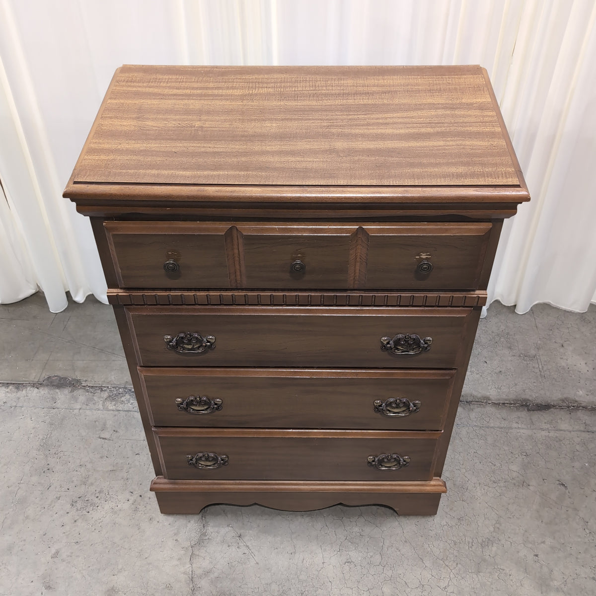 Traditional Warm Wood Five-Drawer Dresser with Ornate Hardware