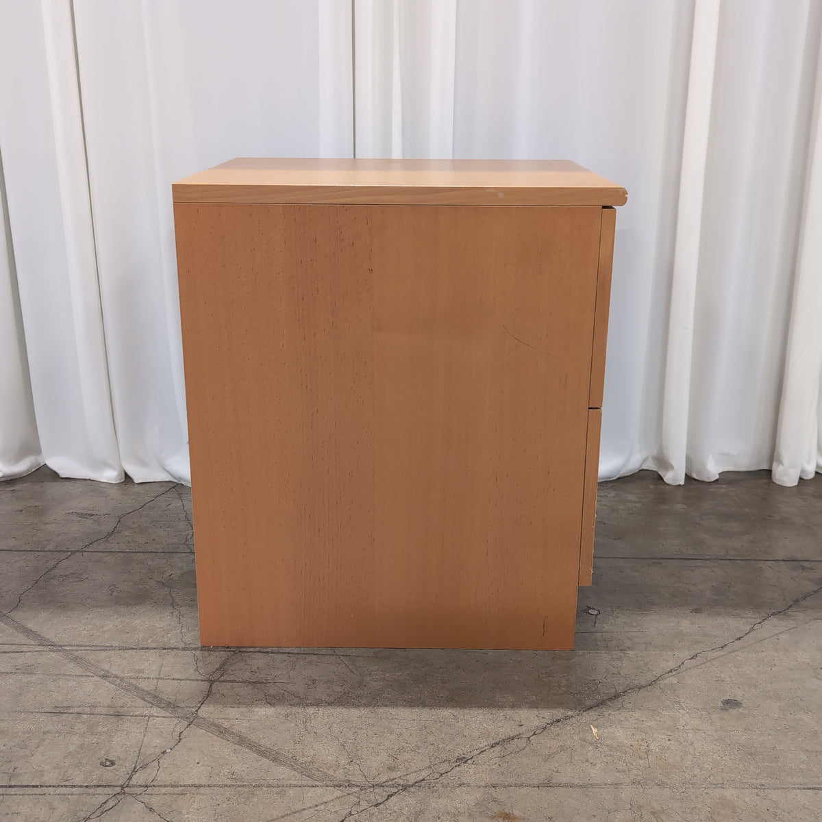 Light Wood Two-Drawer Nightstand with Silver Knobs
