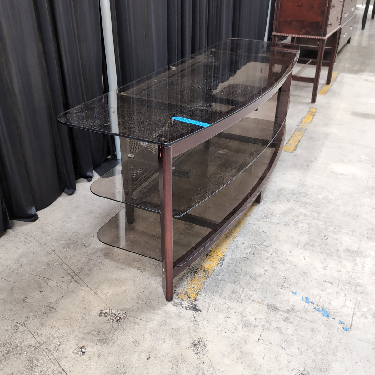 Dark Wood Curved Front Three-Tier TV Stand with Glass Shelves