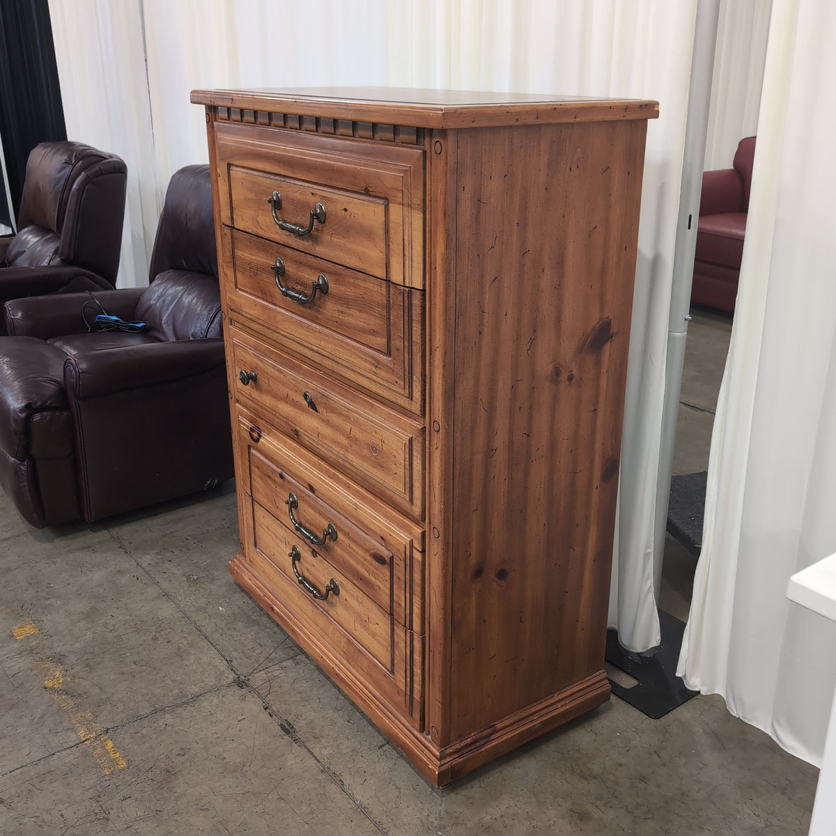 Honey-Toned Wood Four-Drawer Dresser with Decorative Molding
