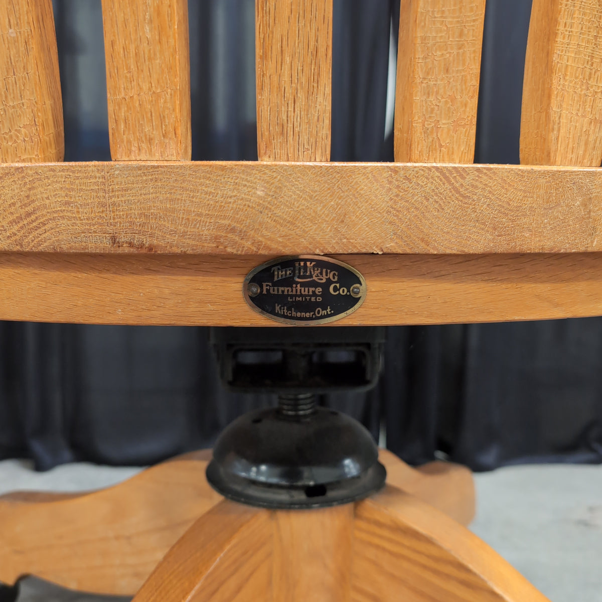 Golden Oak Slat Back Swivel Chair