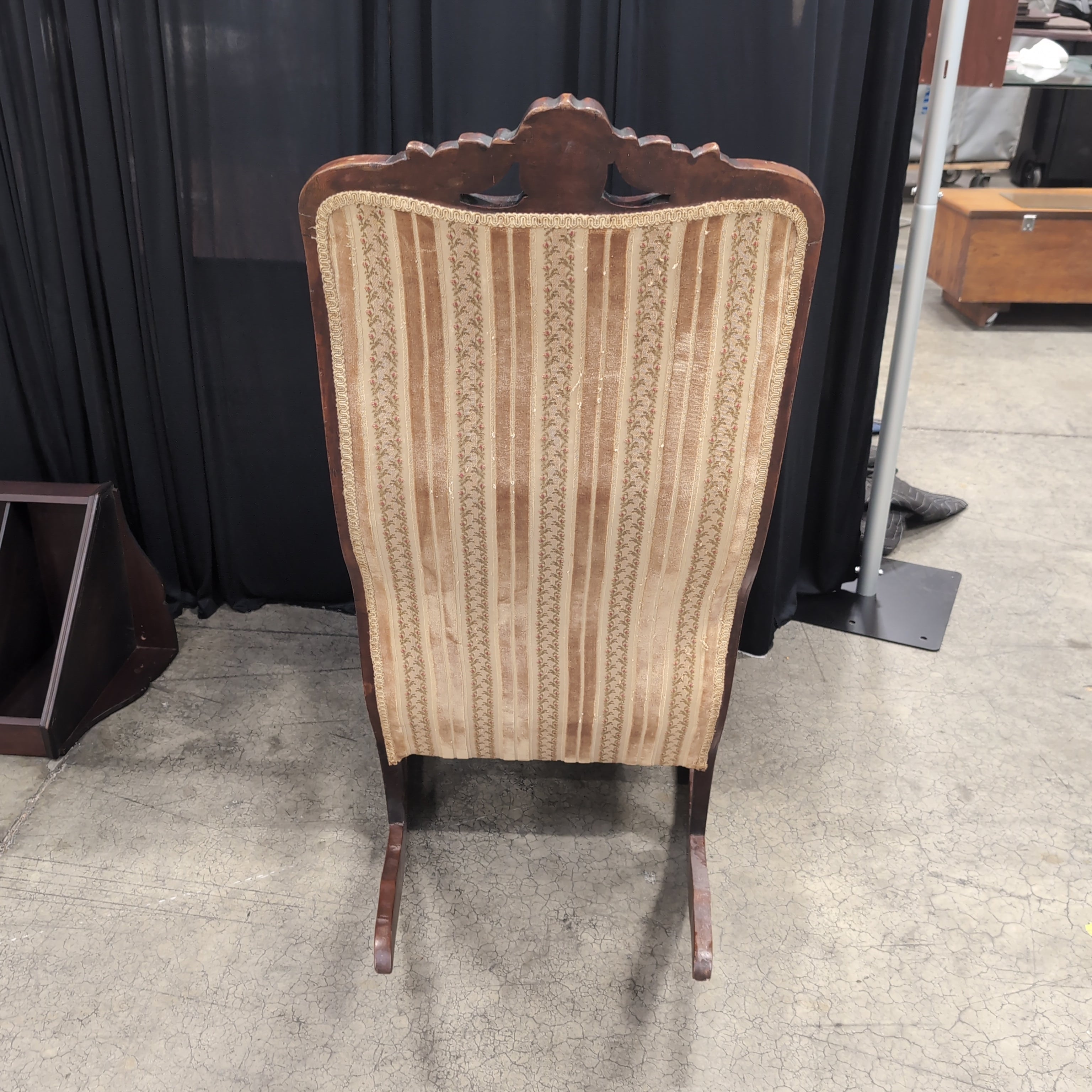Ornate Carved Wood Upholstered Armchair with Floral Stripes