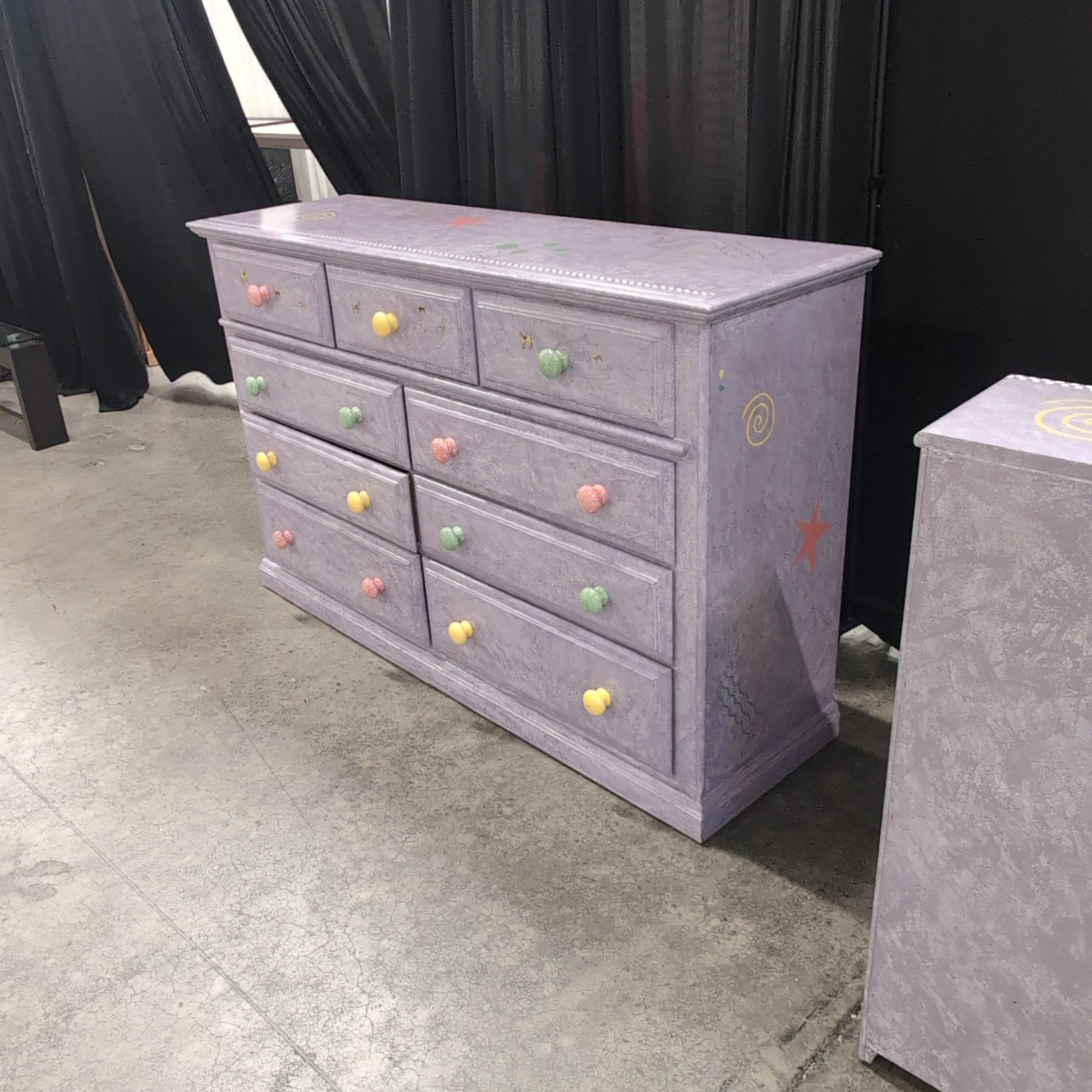 Lavender Nine-Drawer Dresser with Colorful Knobs