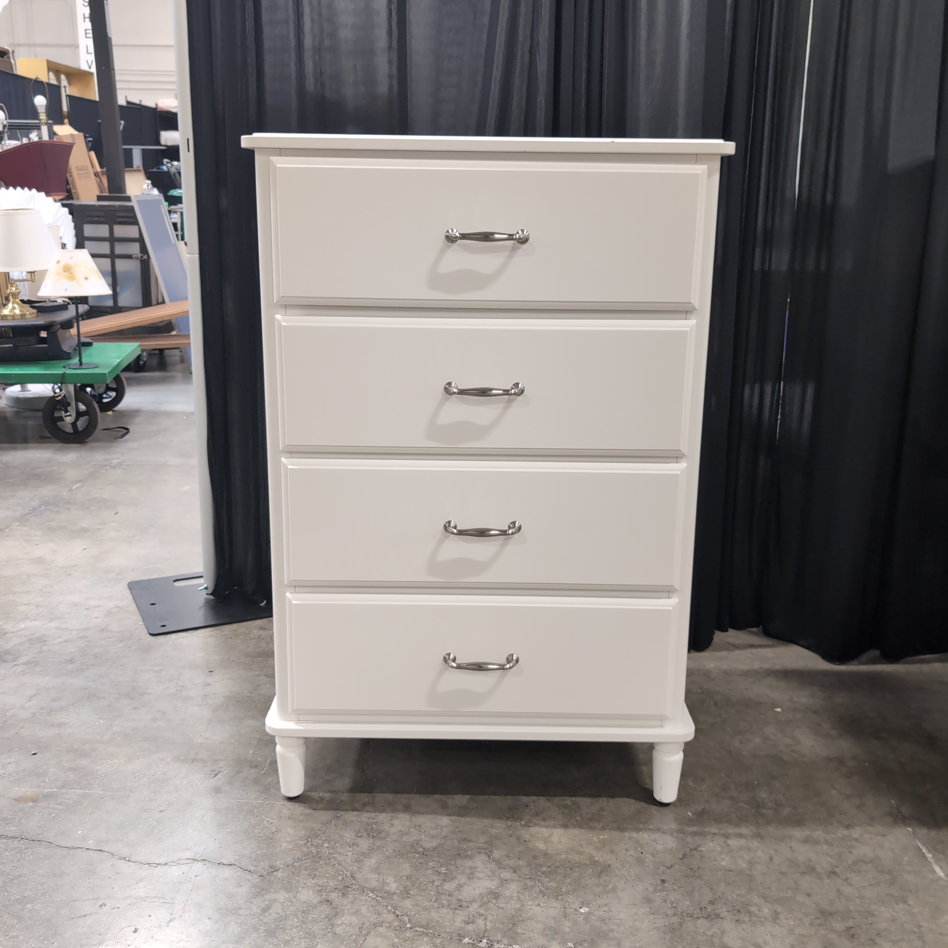White Four-Drawer Dresser with Silver Pulls