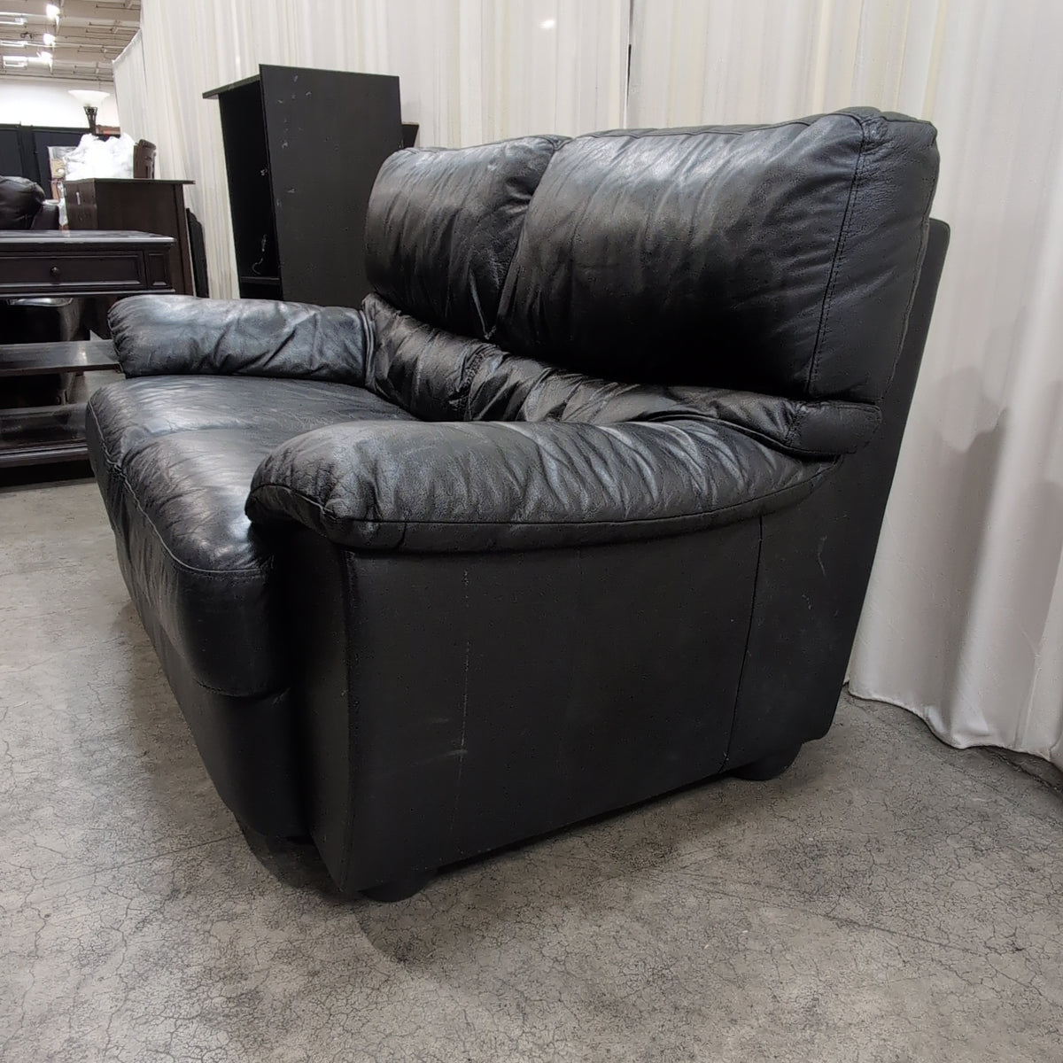 Black Leather Three-Seat Couch with Padded Arms