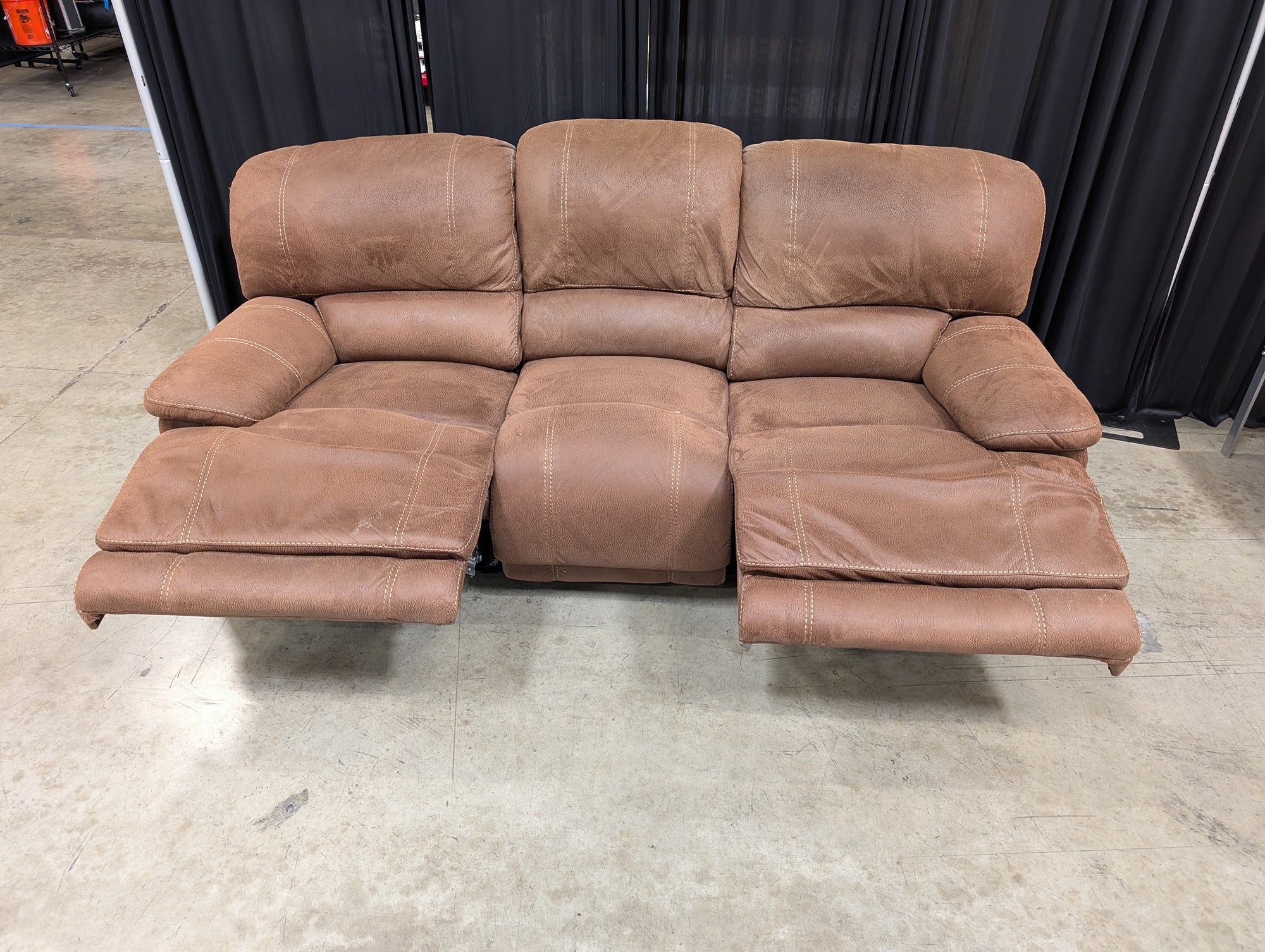 Brown Faux Leather Three-Seat Reclining Couch