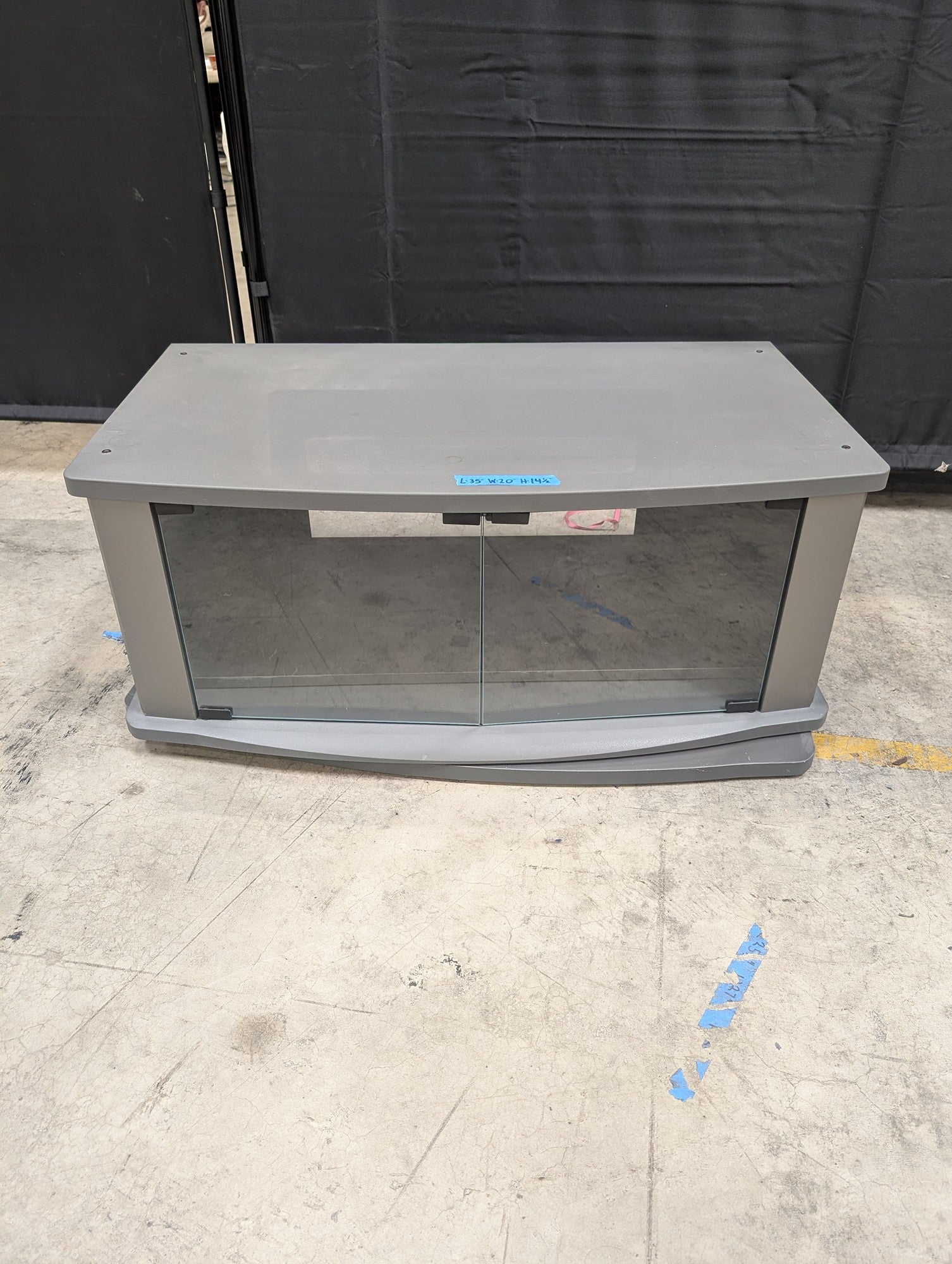 Gray Wood Composite TV Stand with Glass Doors