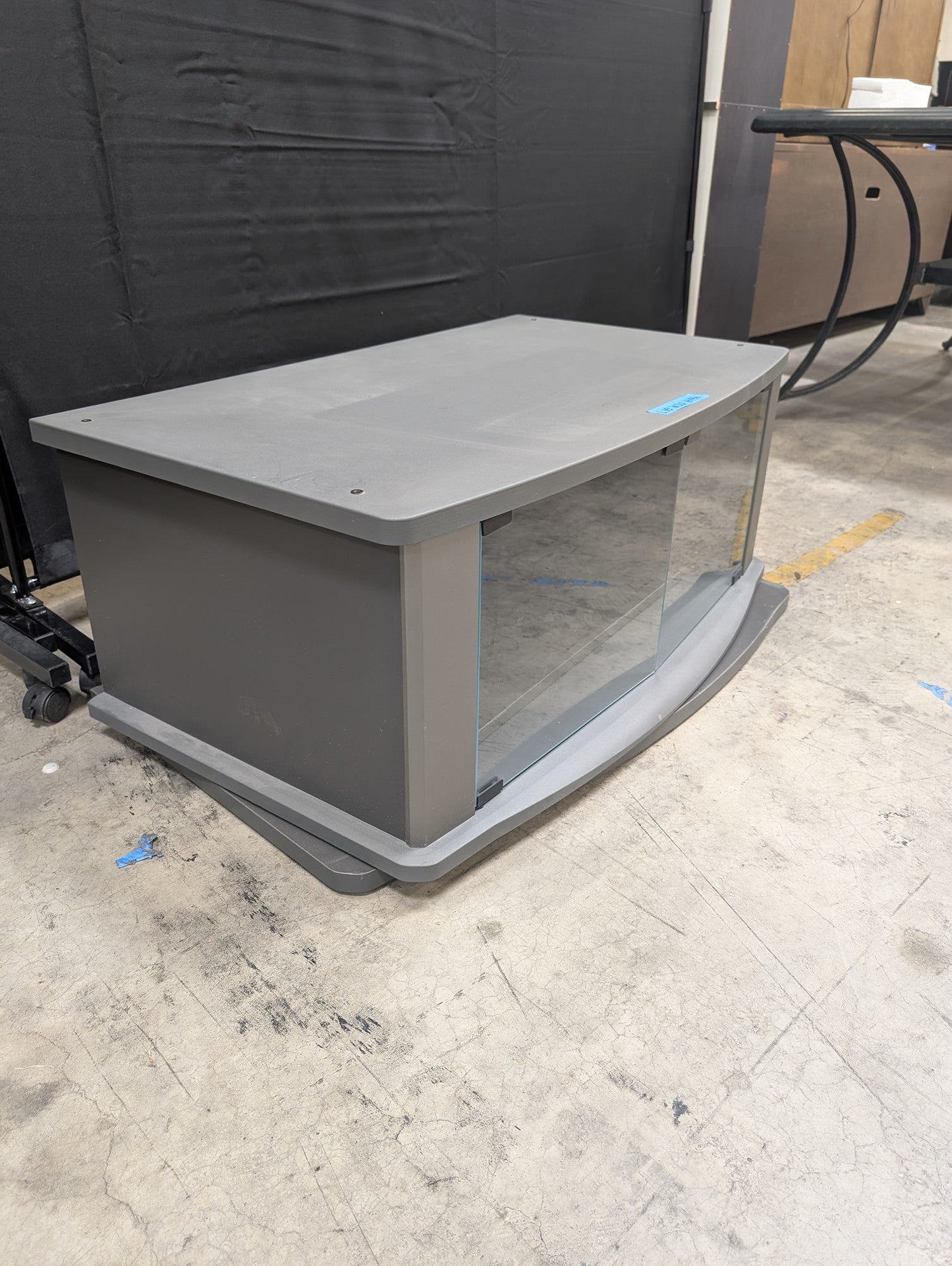Gray Wood Composite TV Stand with Glass Doors