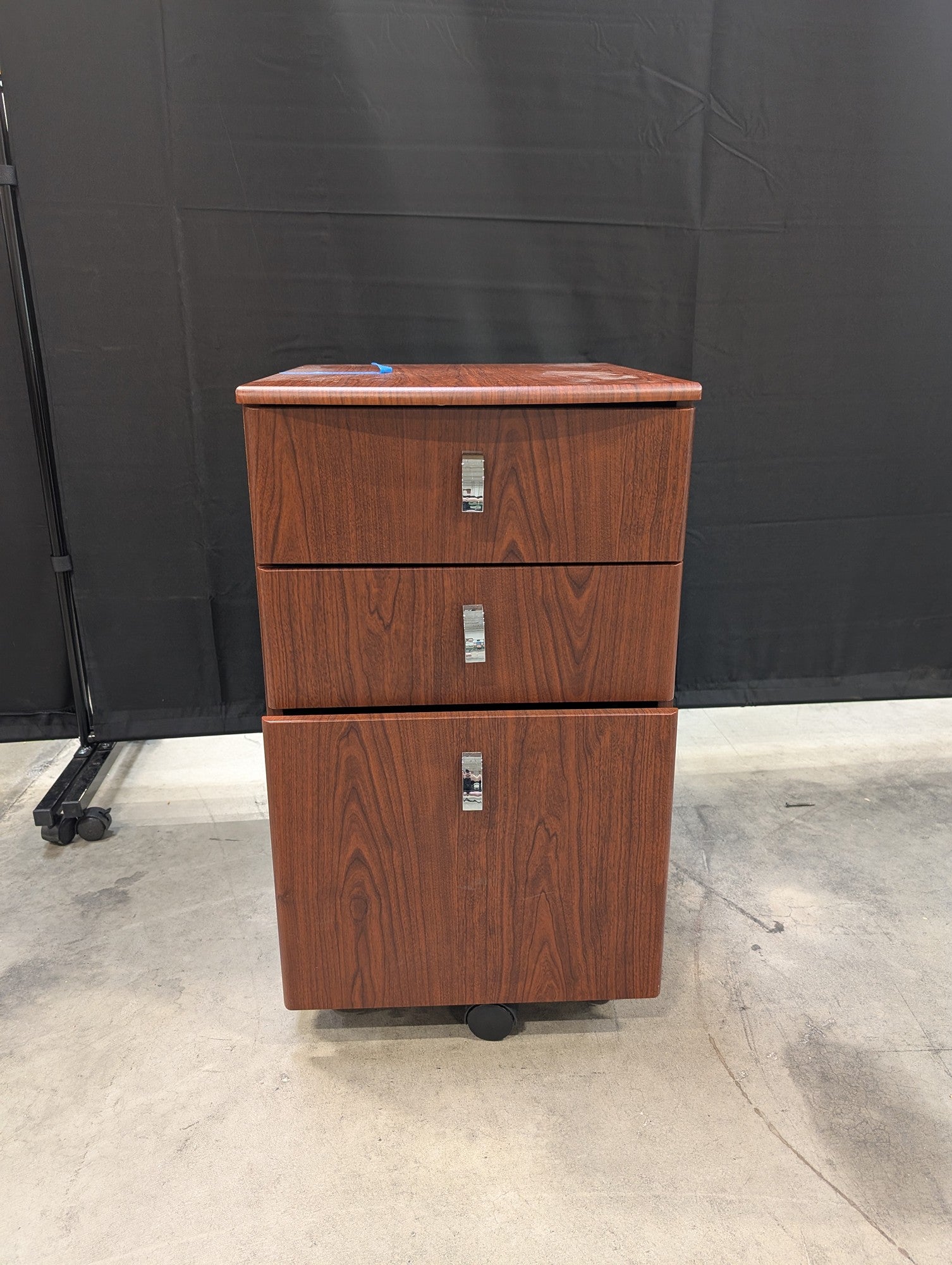 Brown Wood Grain Three-Drawer Filing Cabinet with Casters