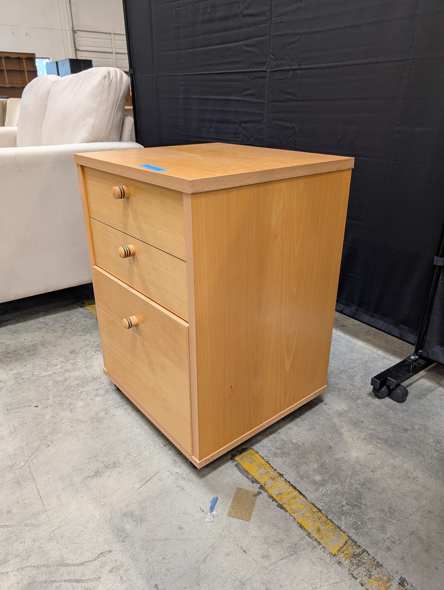 Light Wood Three-Drawer Storage Cabinet with Casters