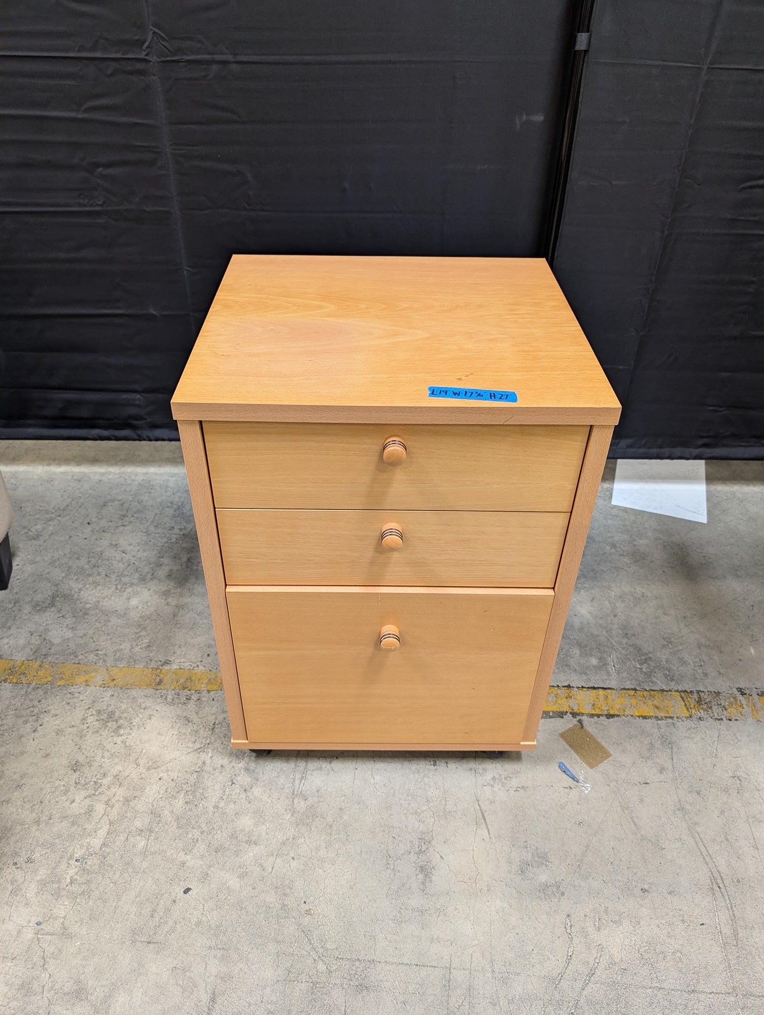 Light Wood Three-Drawer Storage Cabinet with Casters
