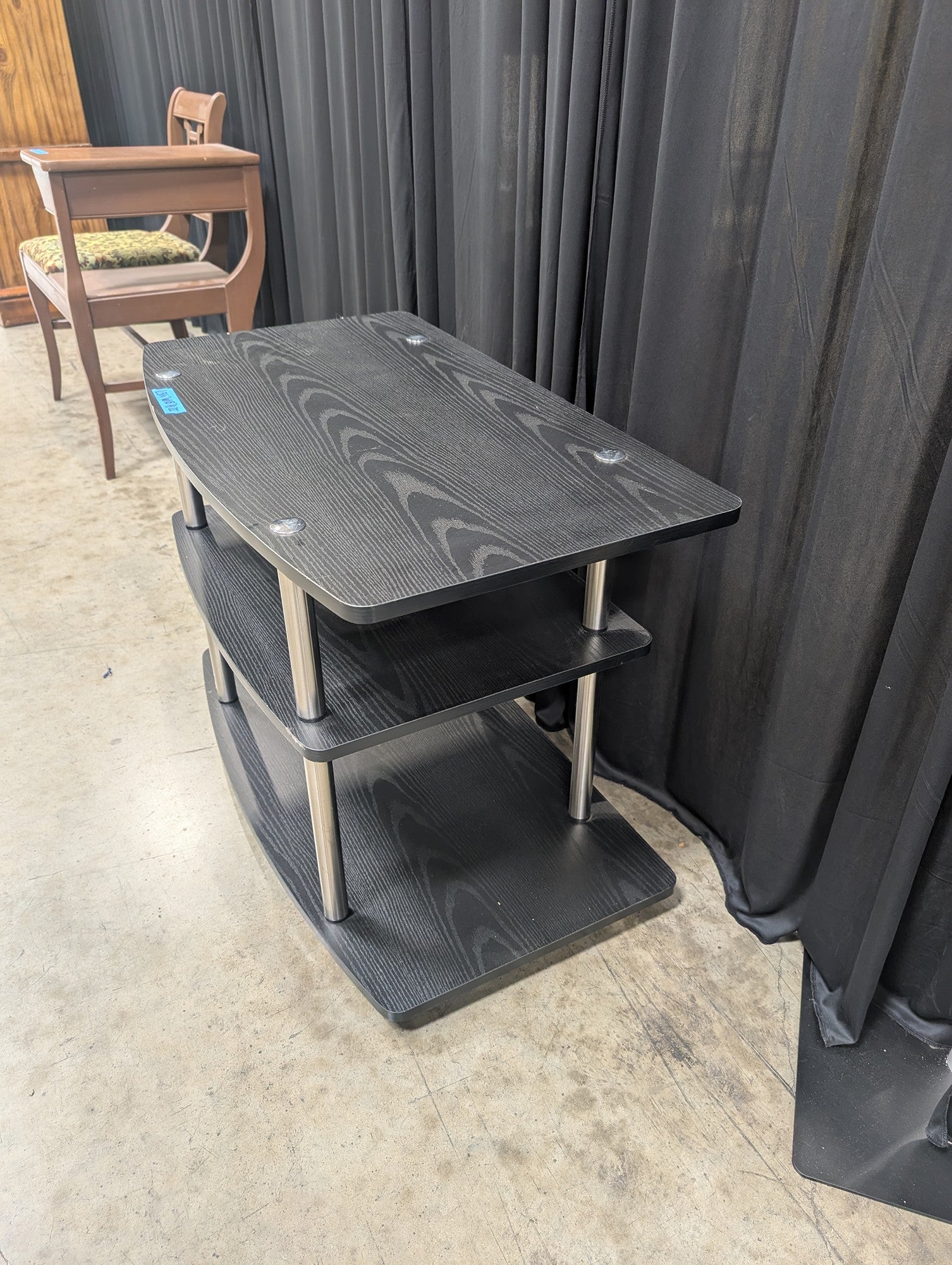 Black Three-Tier TV Stand with Curved Shelves