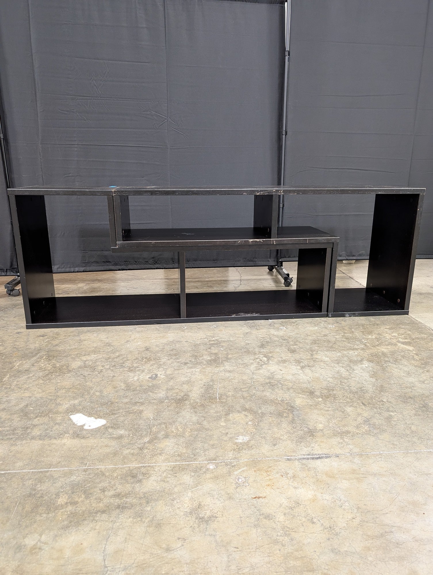 Black Laminate Staggered Shelf TV Stand