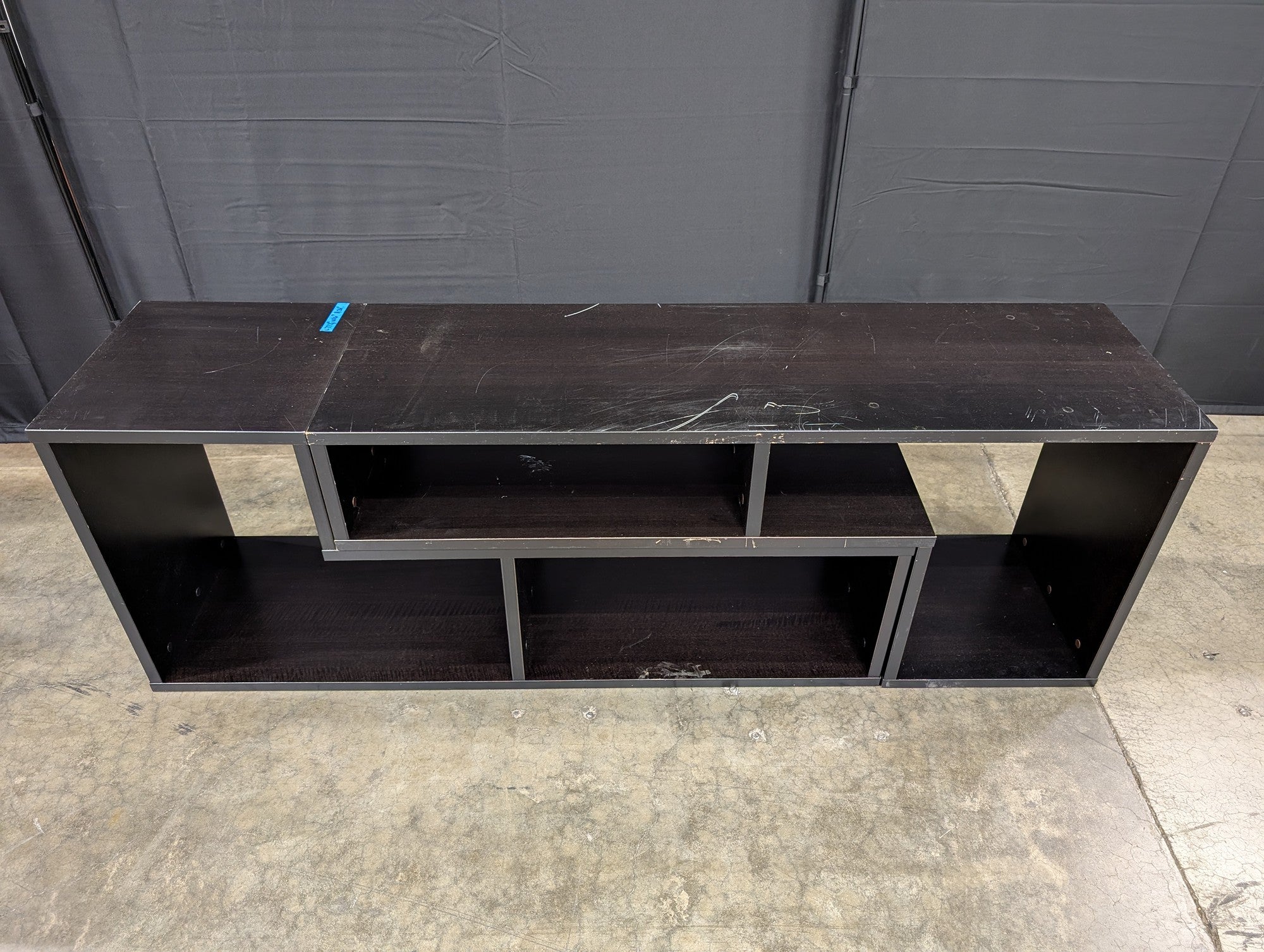Black Laminate Staggered Shelf TV Stand