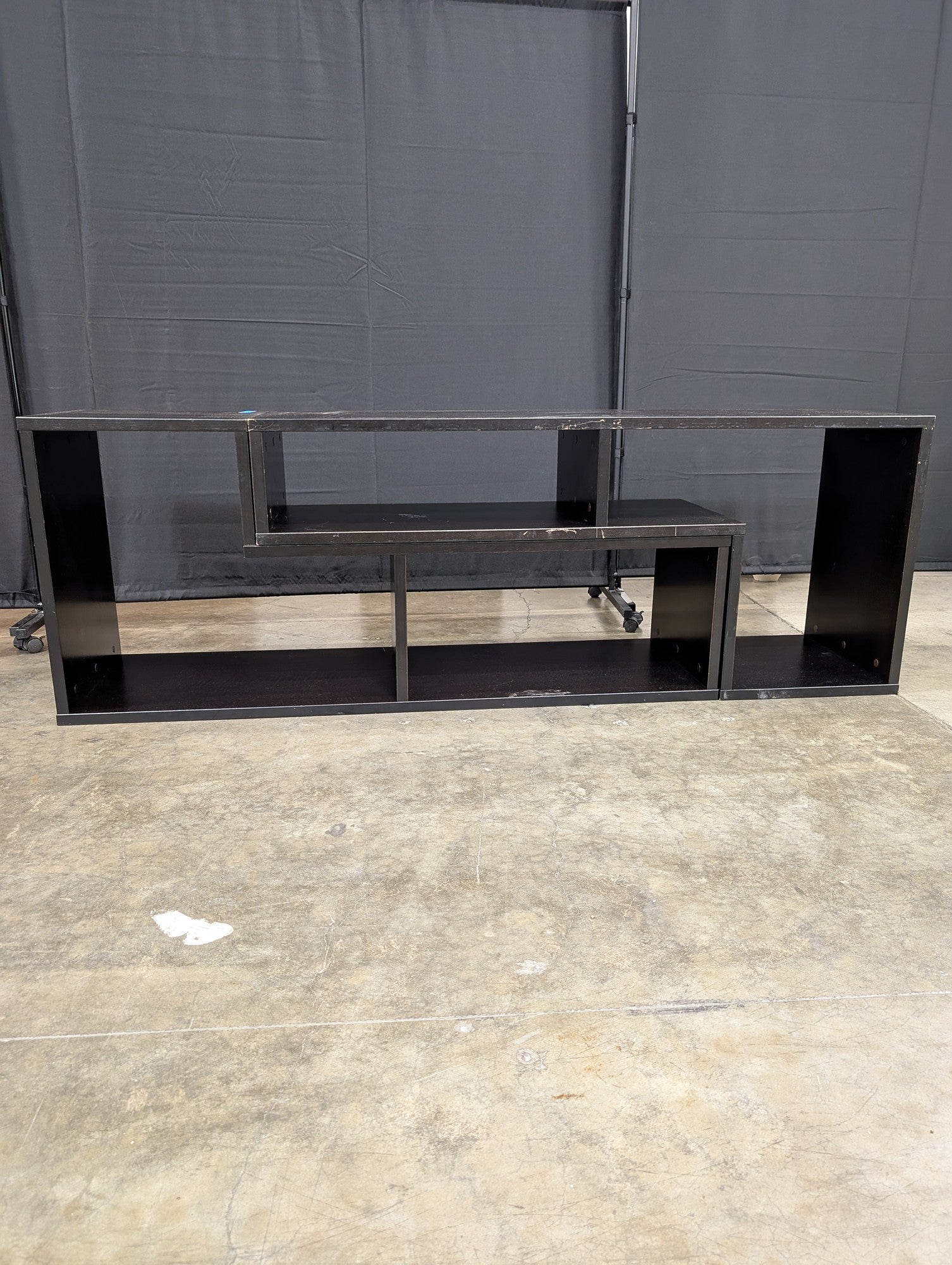Black Laminate Staggered Shelf TV Stand