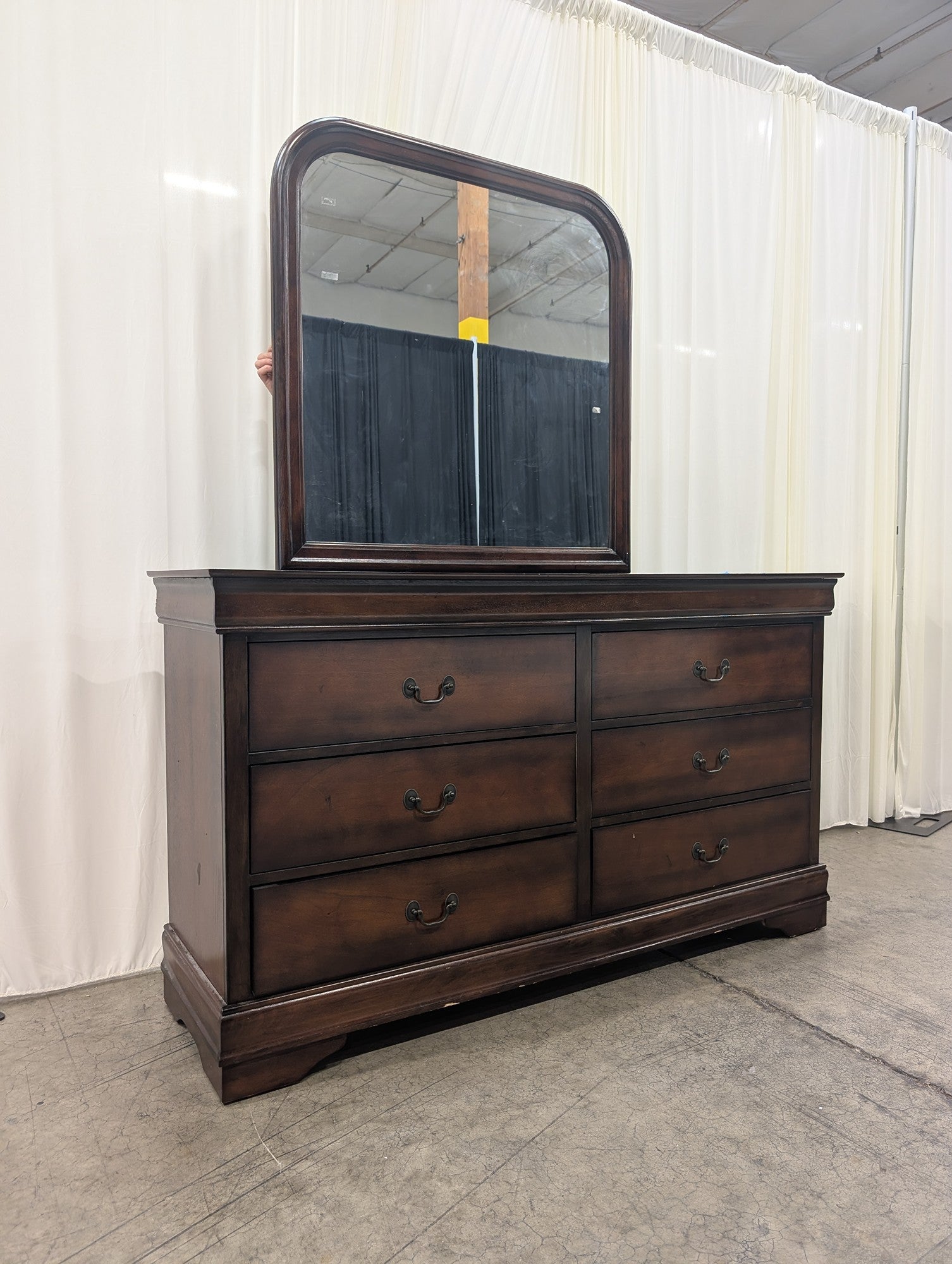 Dark Wood Six-Drawer Dresser with Rounded Mirror