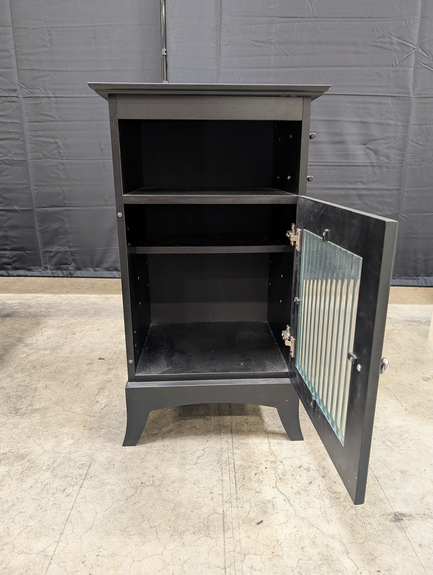 Black Wood Nightstand with Ribbed Panel Door