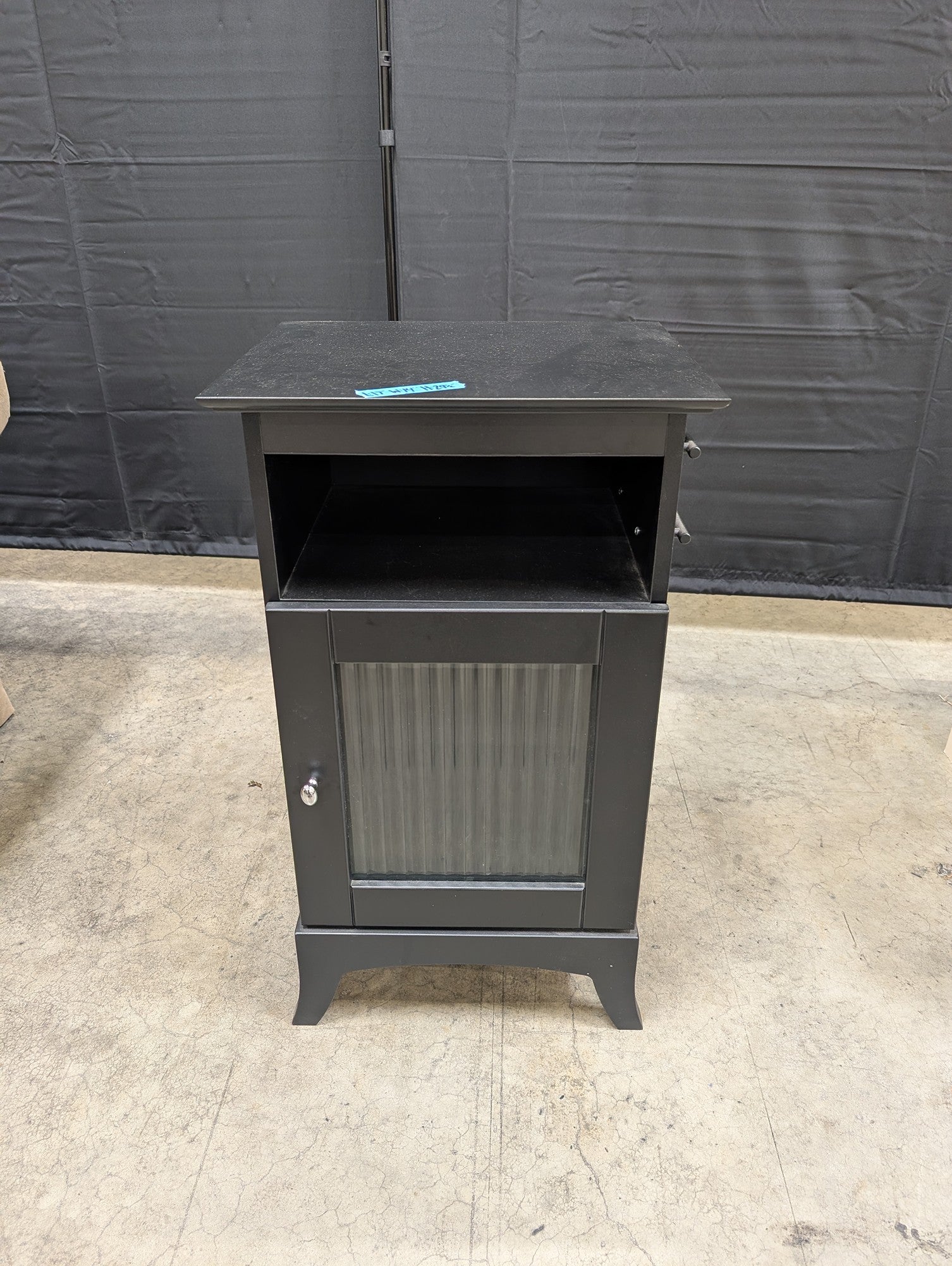 Black Wood Nightstand with Ribbed Panel Door
