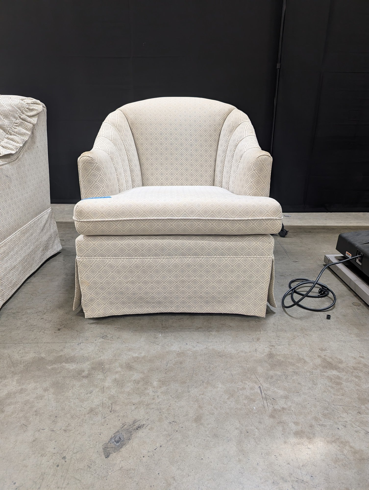 Upholstered Club Chair with Geometric Diamond Pattern and Skirted Base