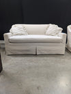 Neutral Patterned Upholstered Loveseat with Skirted Base