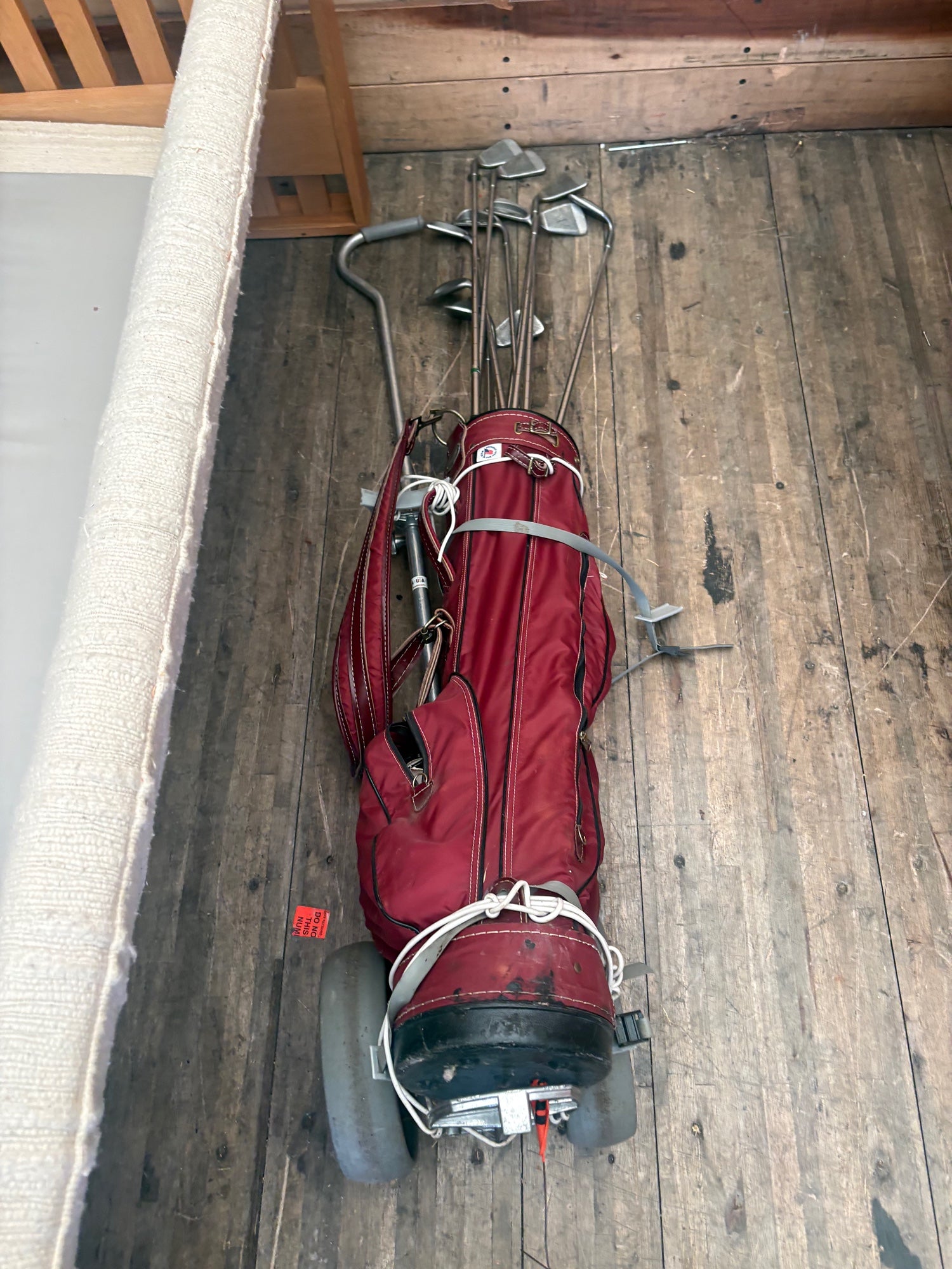 Set of Eleven Golf Clubs with Red Cart Bag and Push Cart