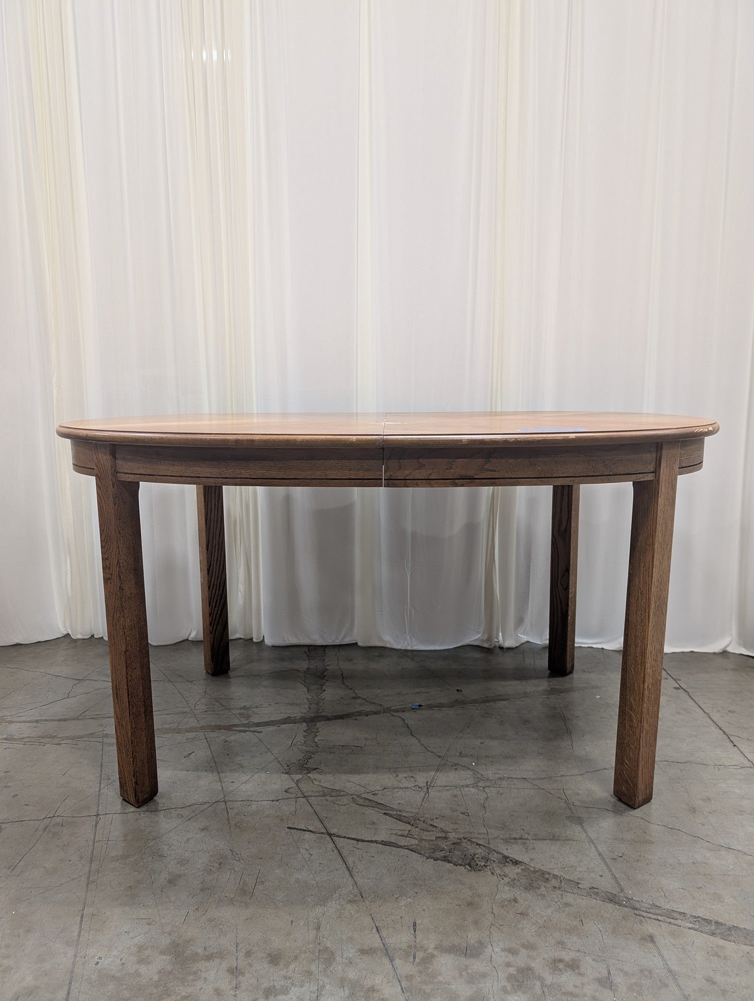Oval Wood Dining Table with Extension Leaf