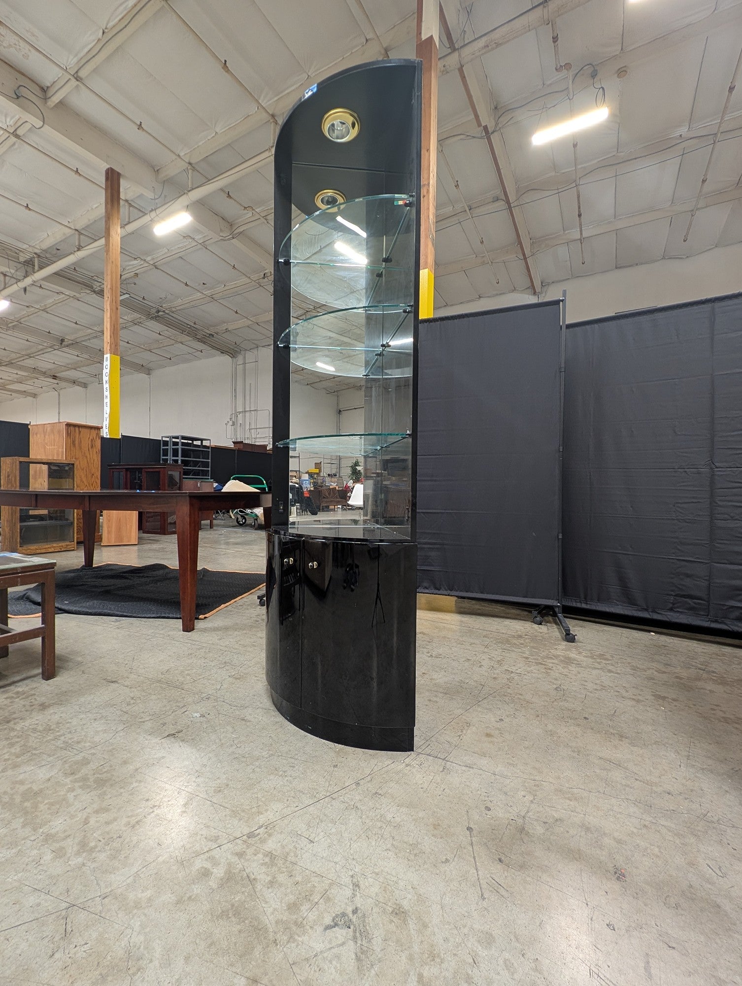 Glossy Black Curved Display Cabinet with Illuminated Glass Shelves