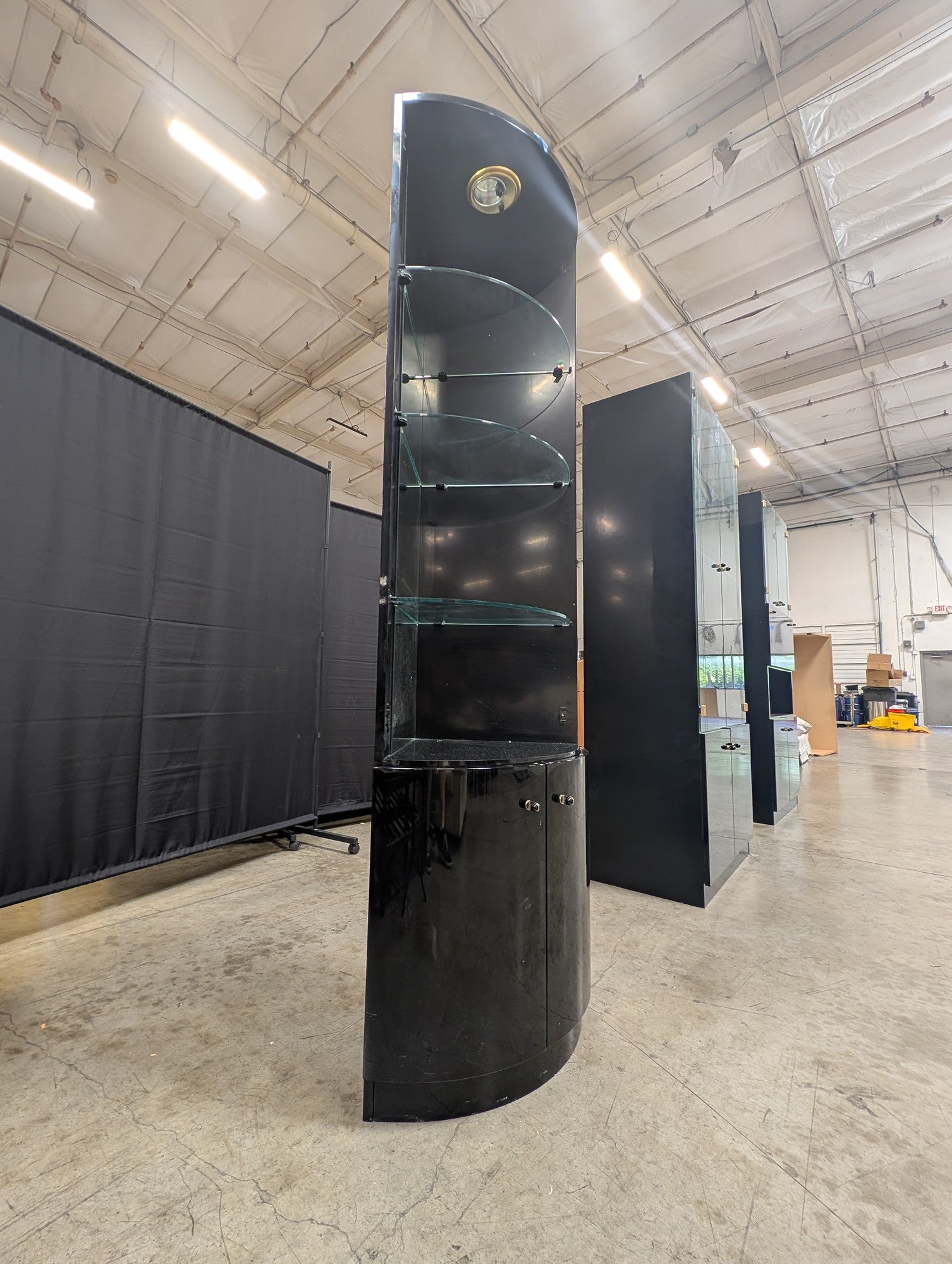 Glossy Black Curved Display Cabinet with Illuminated Glass Shelves