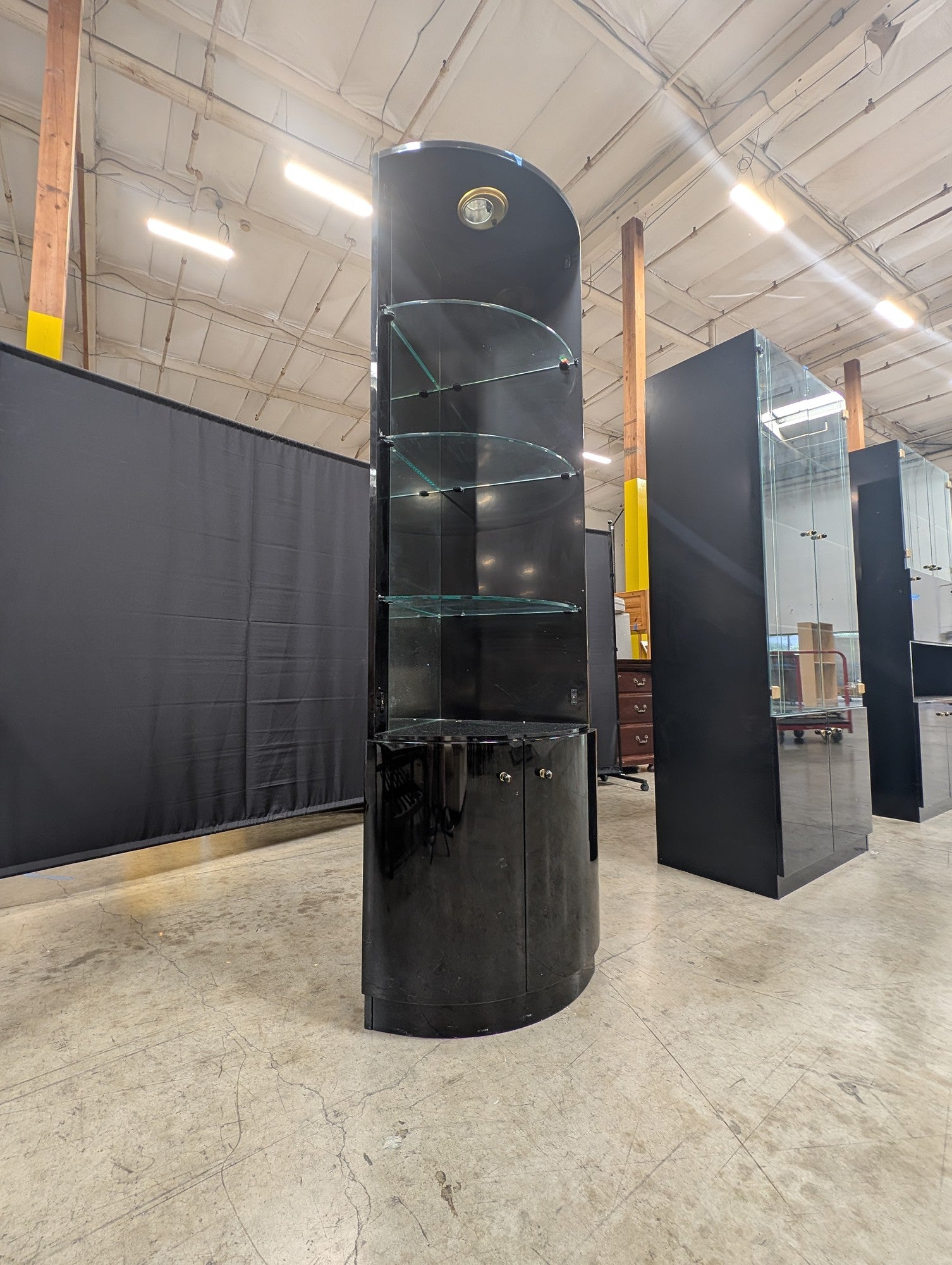 Glossy Black Curved Display Cabinet with Illuminated Glass Shelves