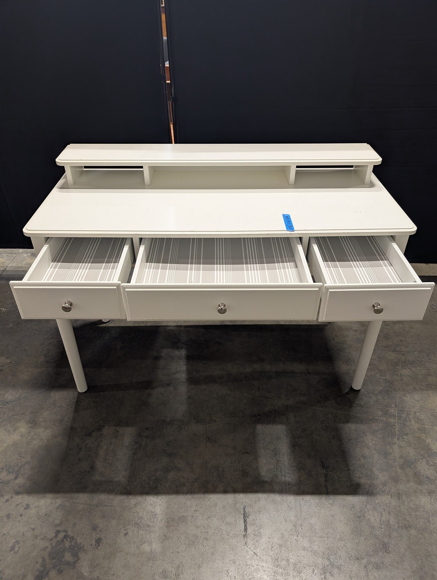 White Three-Drawer Desk with Storage Riser