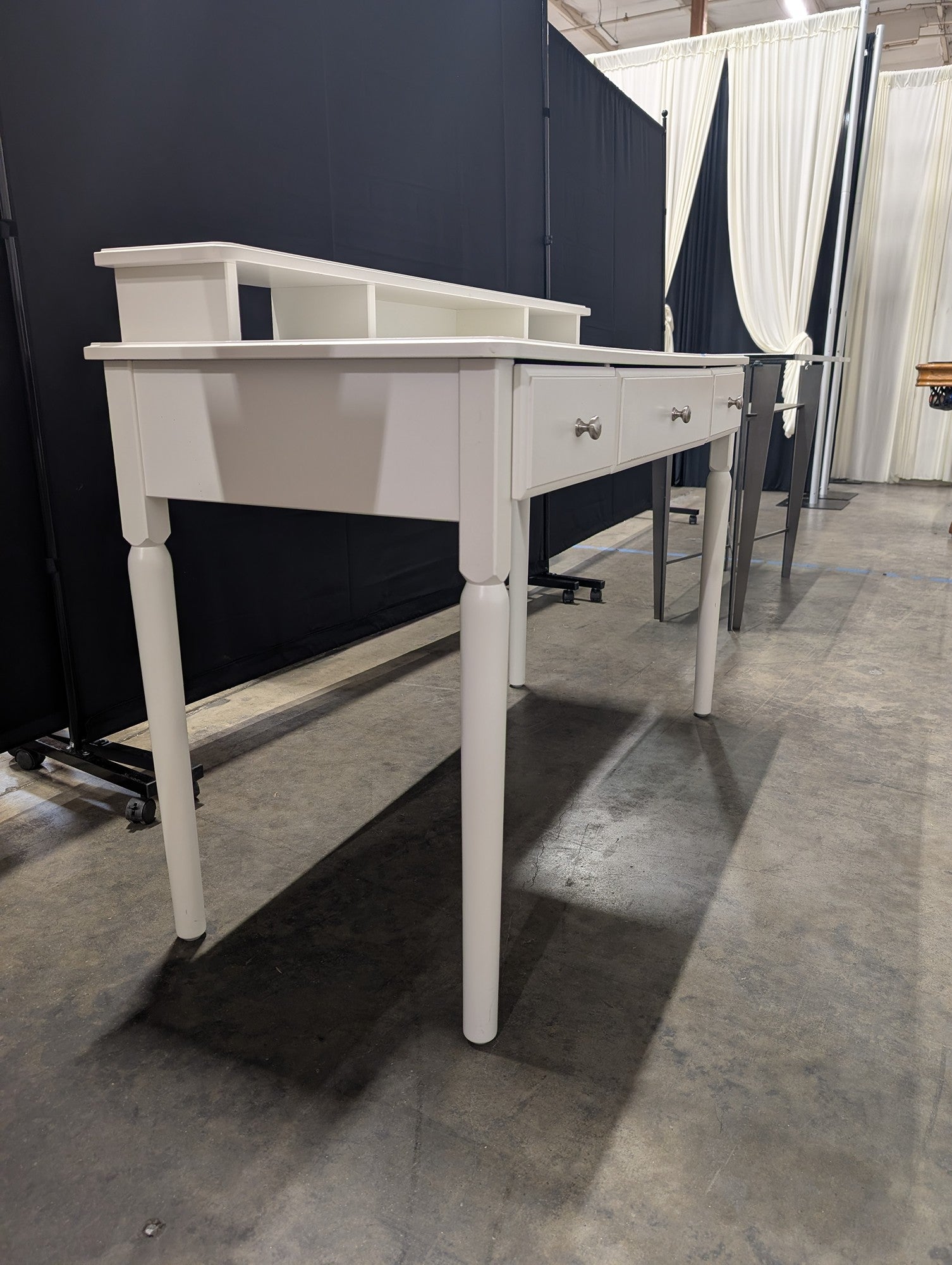 White Three-Drawer Desk with Storage Riser