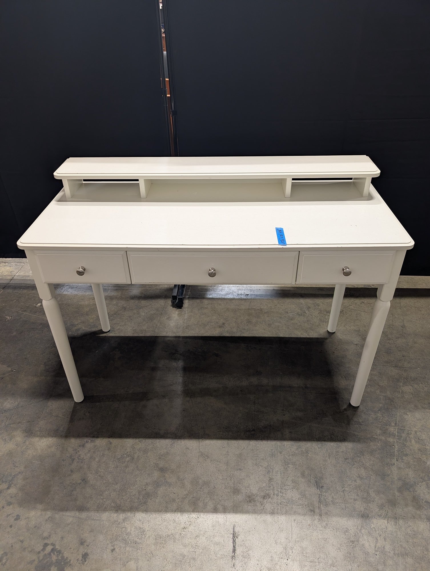 White Three-Drawer Desk with Storage Riser