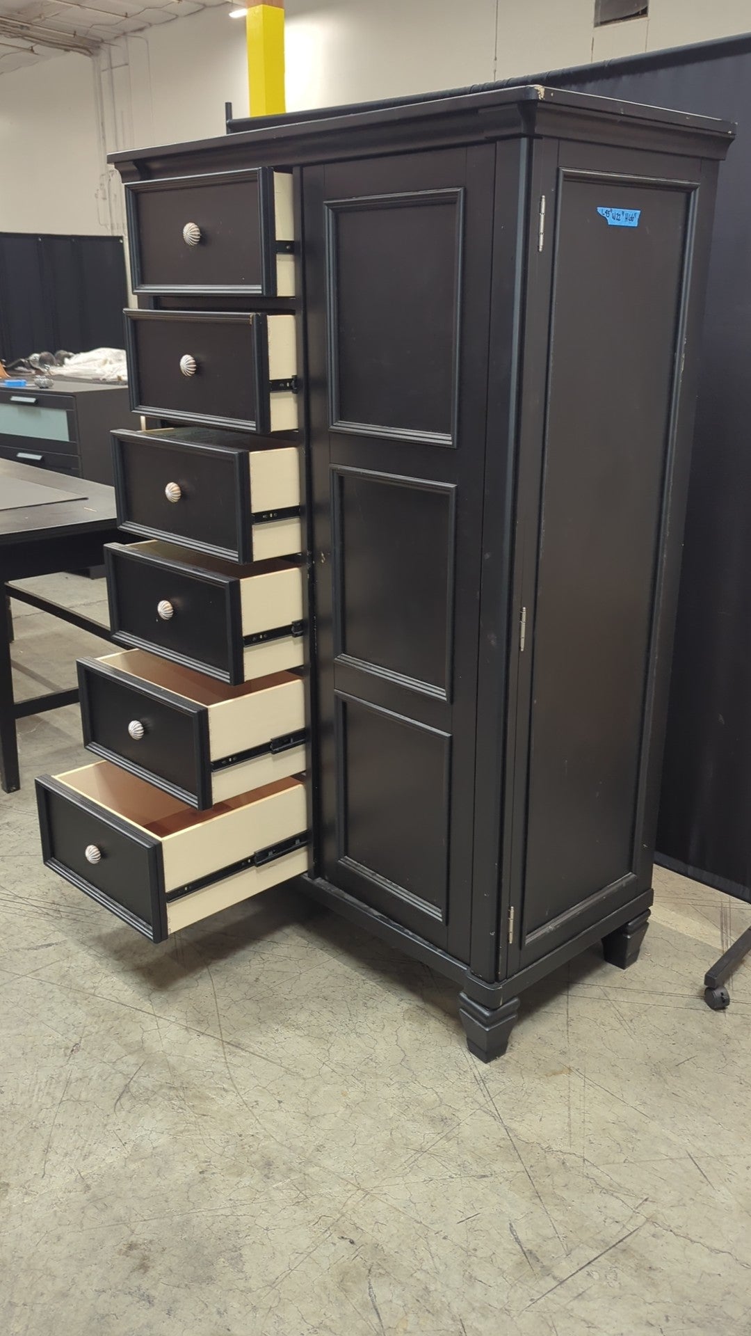 Ashley Furniture Black Wood Armoire with Six Drawers