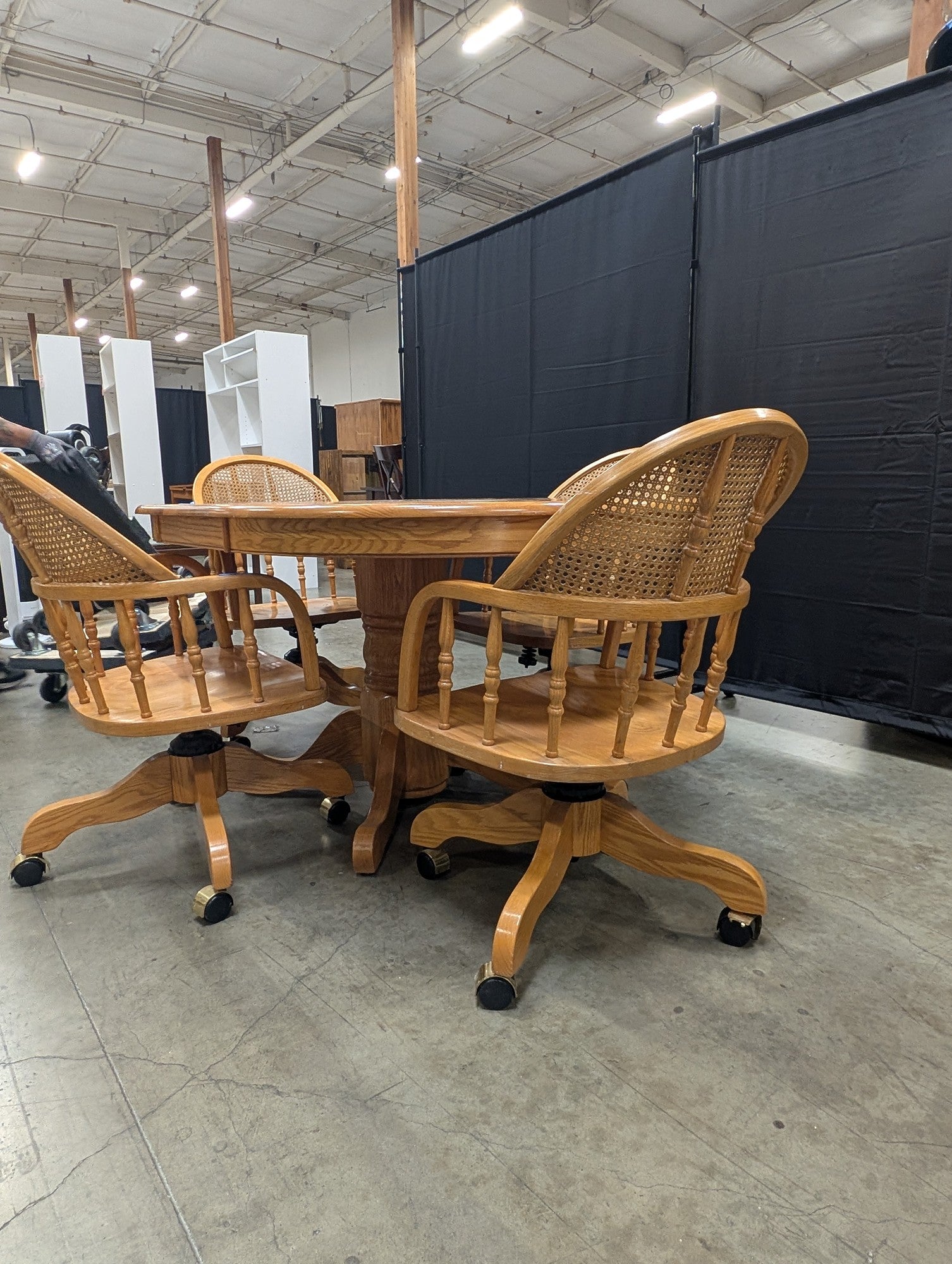 Set with Four Cane Back A-America Furniture Chairs with a Oval Wood Dining Table