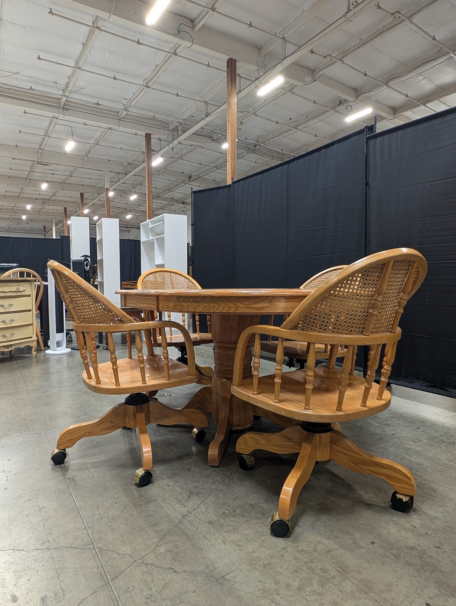 Set with Four Cane Back A-America Furniture Chairs with a Oval Wood Dining Table