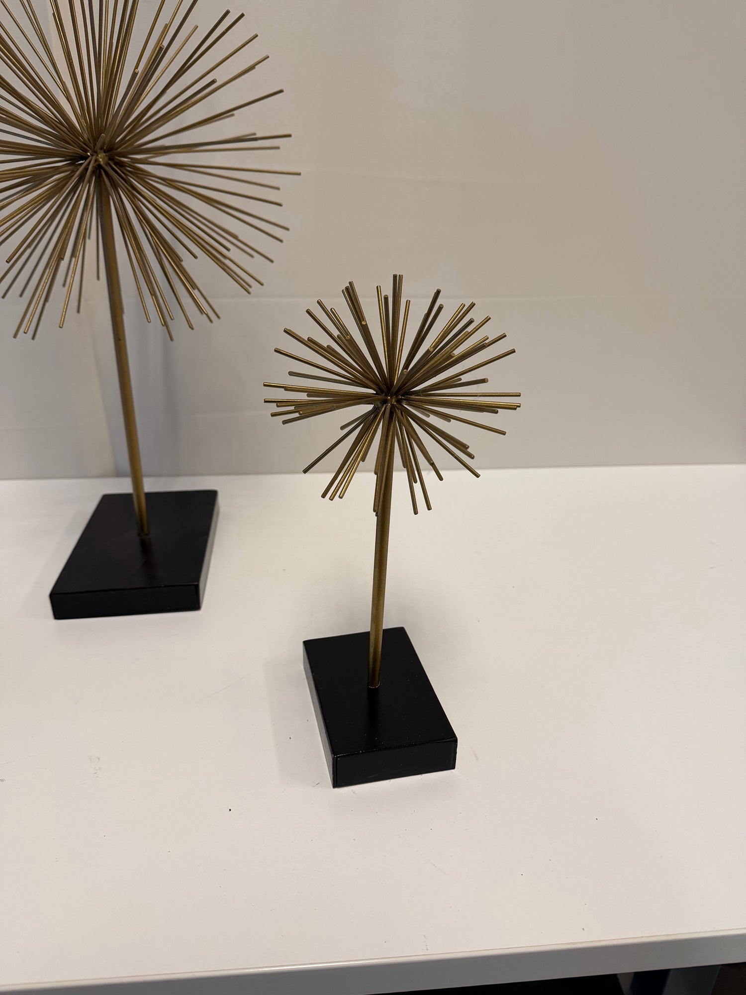 Three Gold Starburst Table Sculptures with Black Base Set