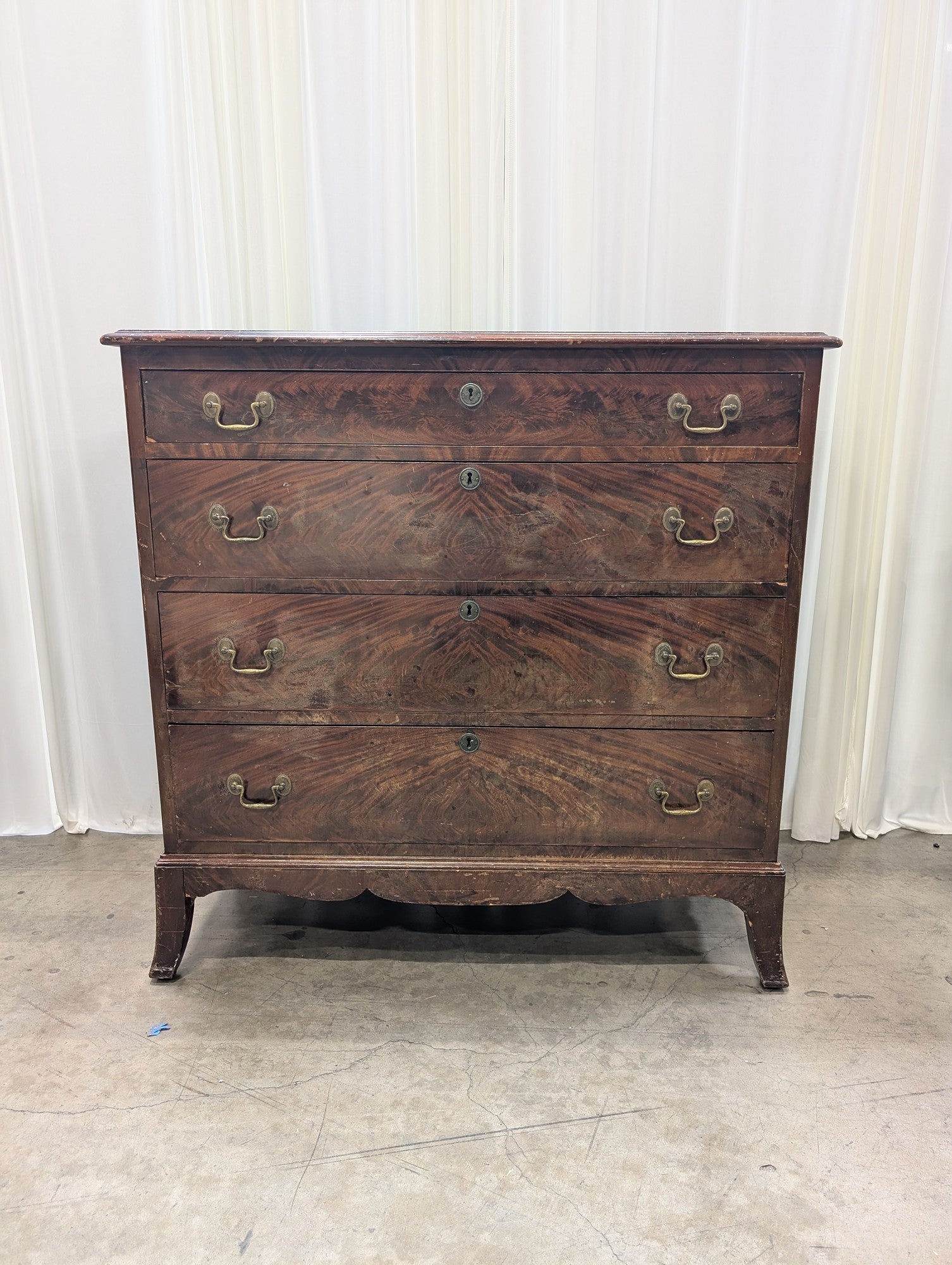 Hathaway's Dark Wood Four-Drawer Dresser with Ornate Hardware