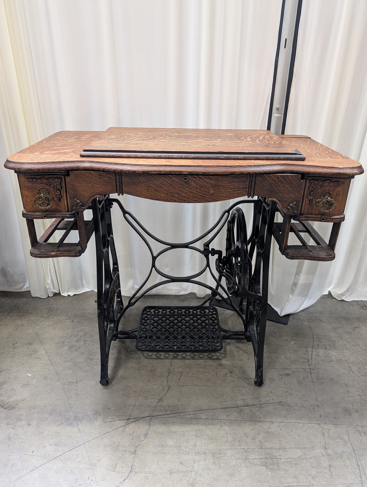 Antique NEW HOME Wood Sewing Machine Cabinet with Ornate Cast Iron Base