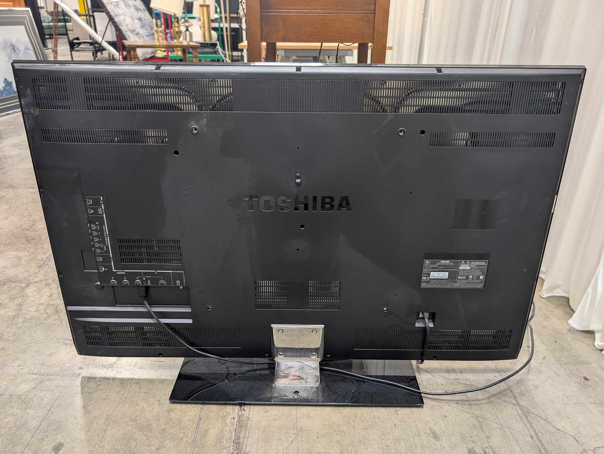 Toshiba Black Flat Screen Television with Stand