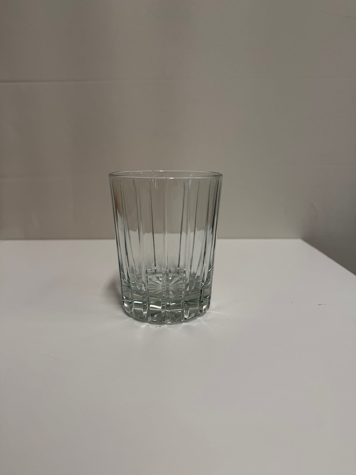 Clear Ribbed Glass Tumbler with Starburst Base