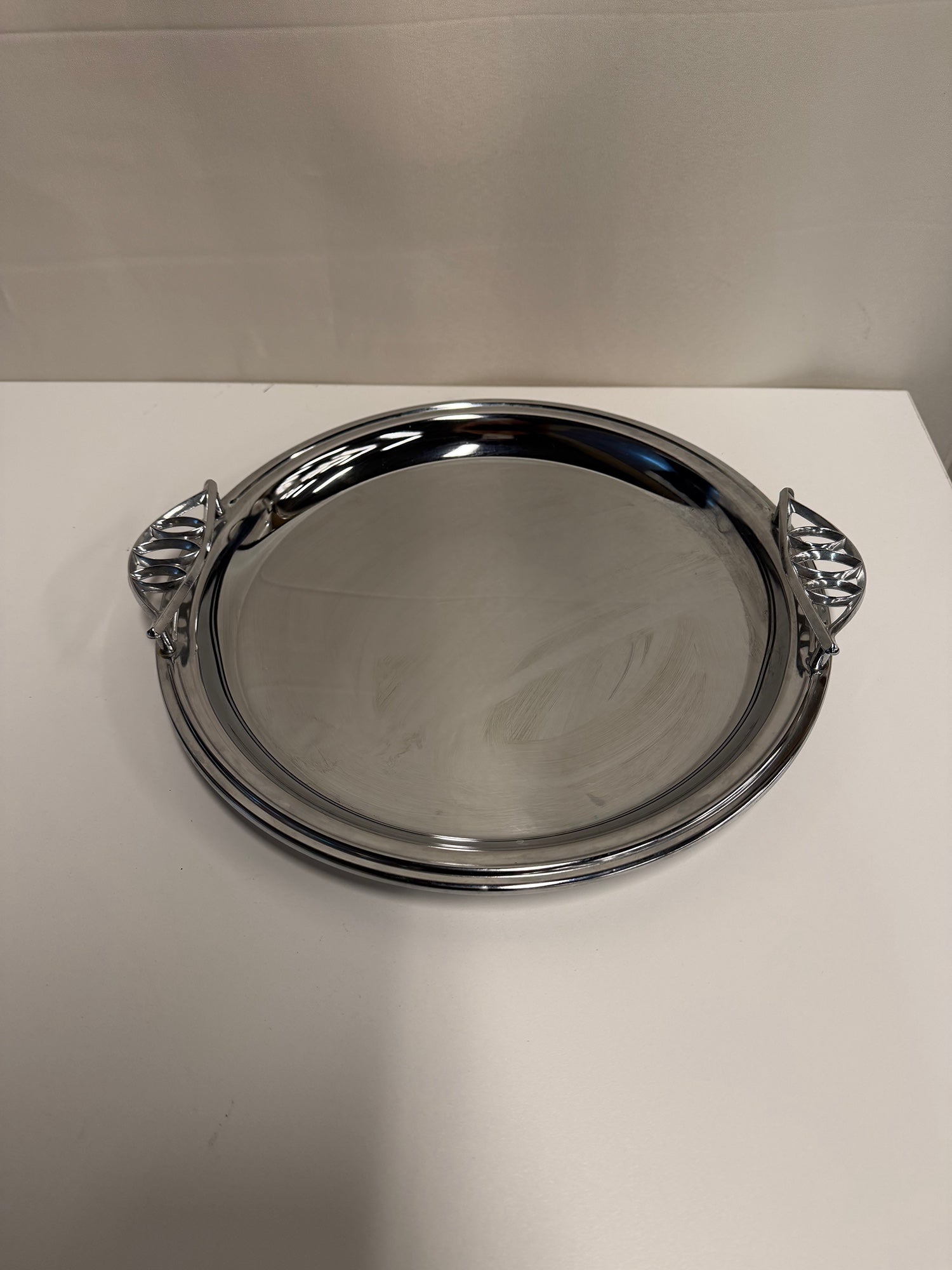 Polished Silver-Tone Oval Serving Tray with Decorative Handles