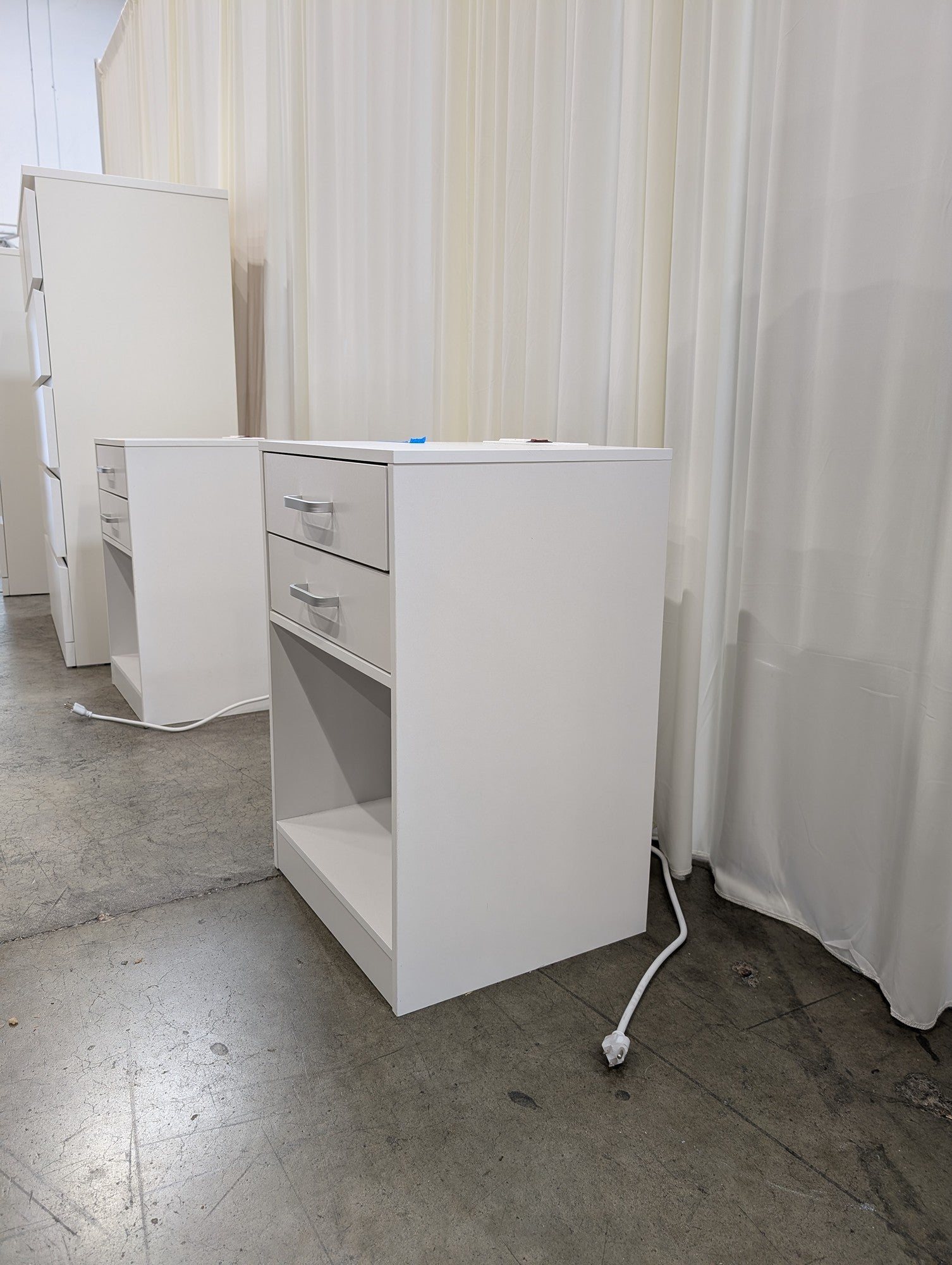 White Two-Drawer Nightstand with Integrated Power